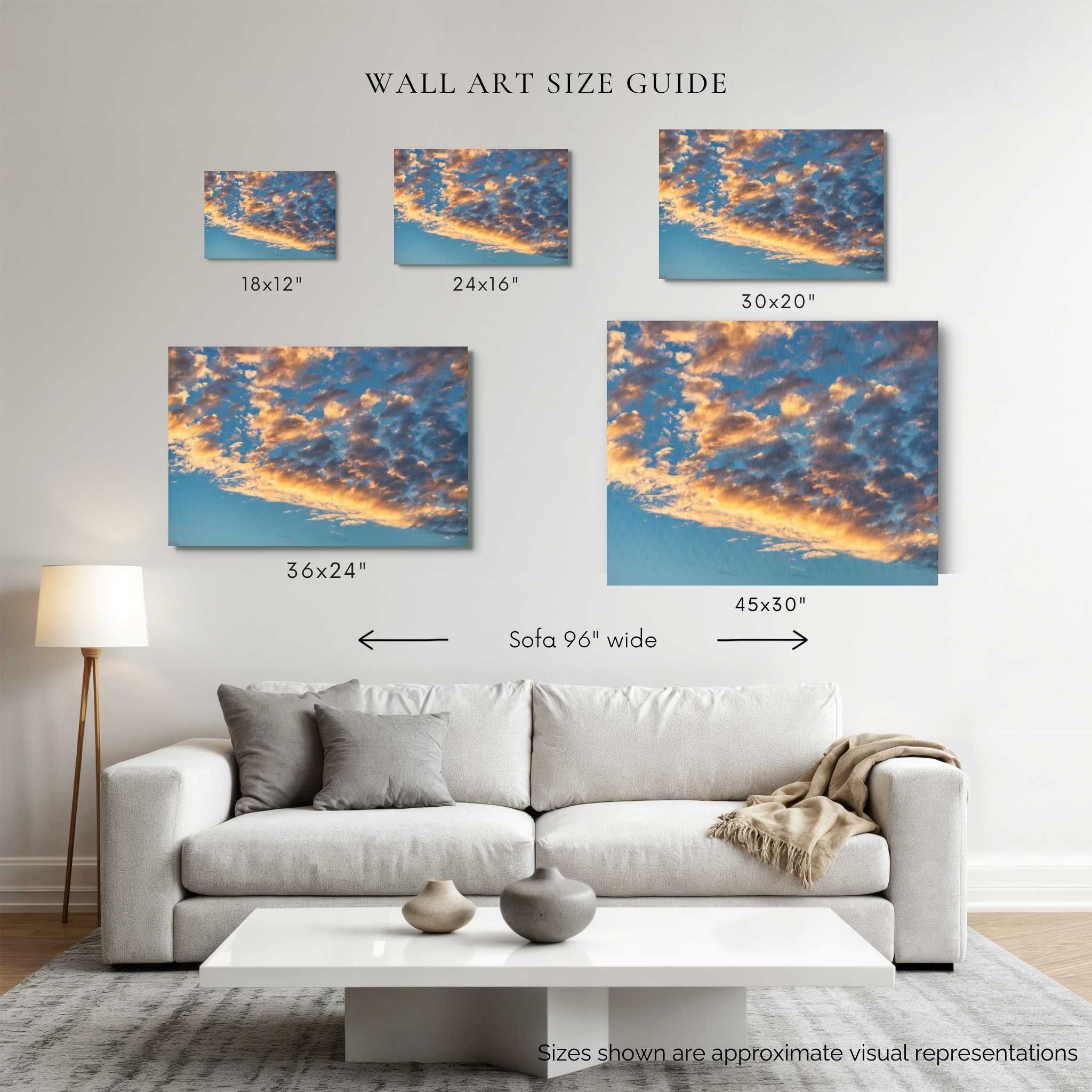 Wall art size guide showing gold and blue symphony of the sky displayed above a 96-inch sofa in 18 × 12, 24 × 16, 30 × 20, 36 × 24, and 45 × 30 inch canvas sizes by Abigail Diane Photography.