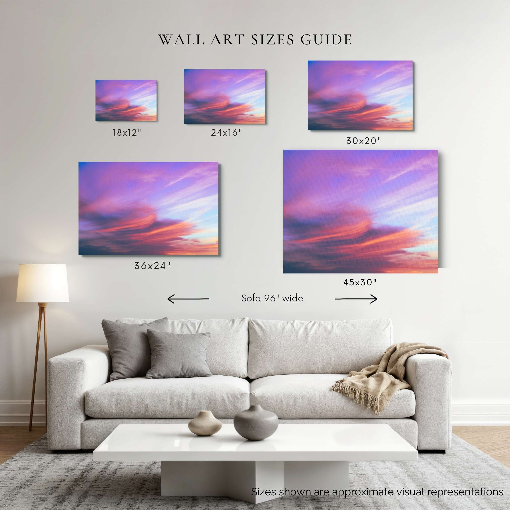 A wall art sizes guide showing five canvas prints with pink and purple sky artwork, labeled 18x12", 24x16", 30x20", 36x24", and 30 x 45", above a white sofa in a living room setting.