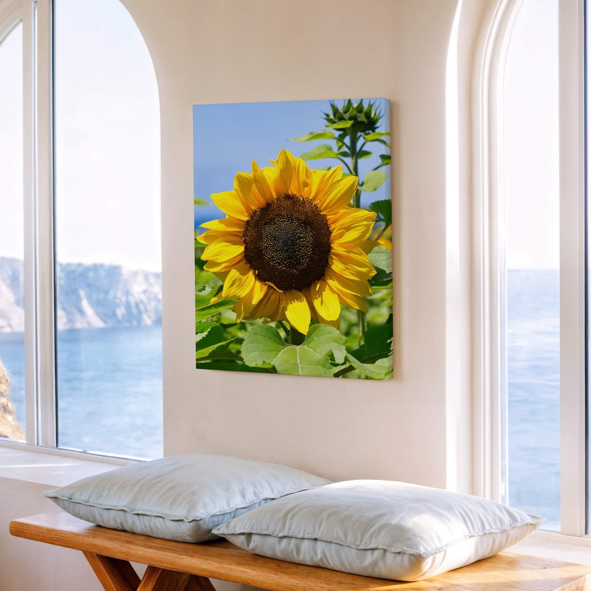 Yellow sunflower canvas print titled Turning Towards the Light by Abigail Diane Photography displayed in a coastal-inspired room overlooking the ocean.