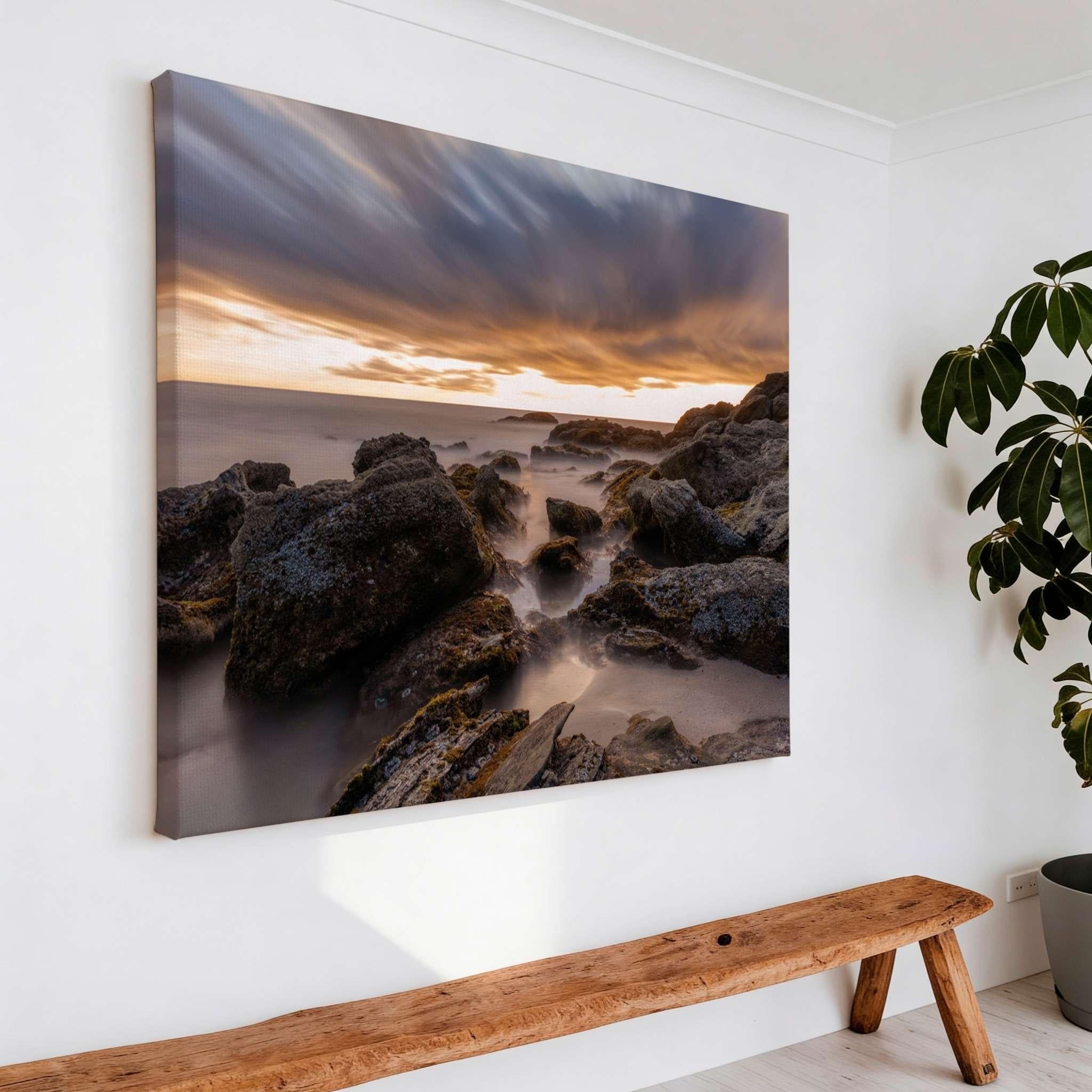 Close-up of the After the Storm gallery-wrapped canvas print, featuring a dramatic long exposure sunset over the rocky shoreline of Laguna Beach, California.