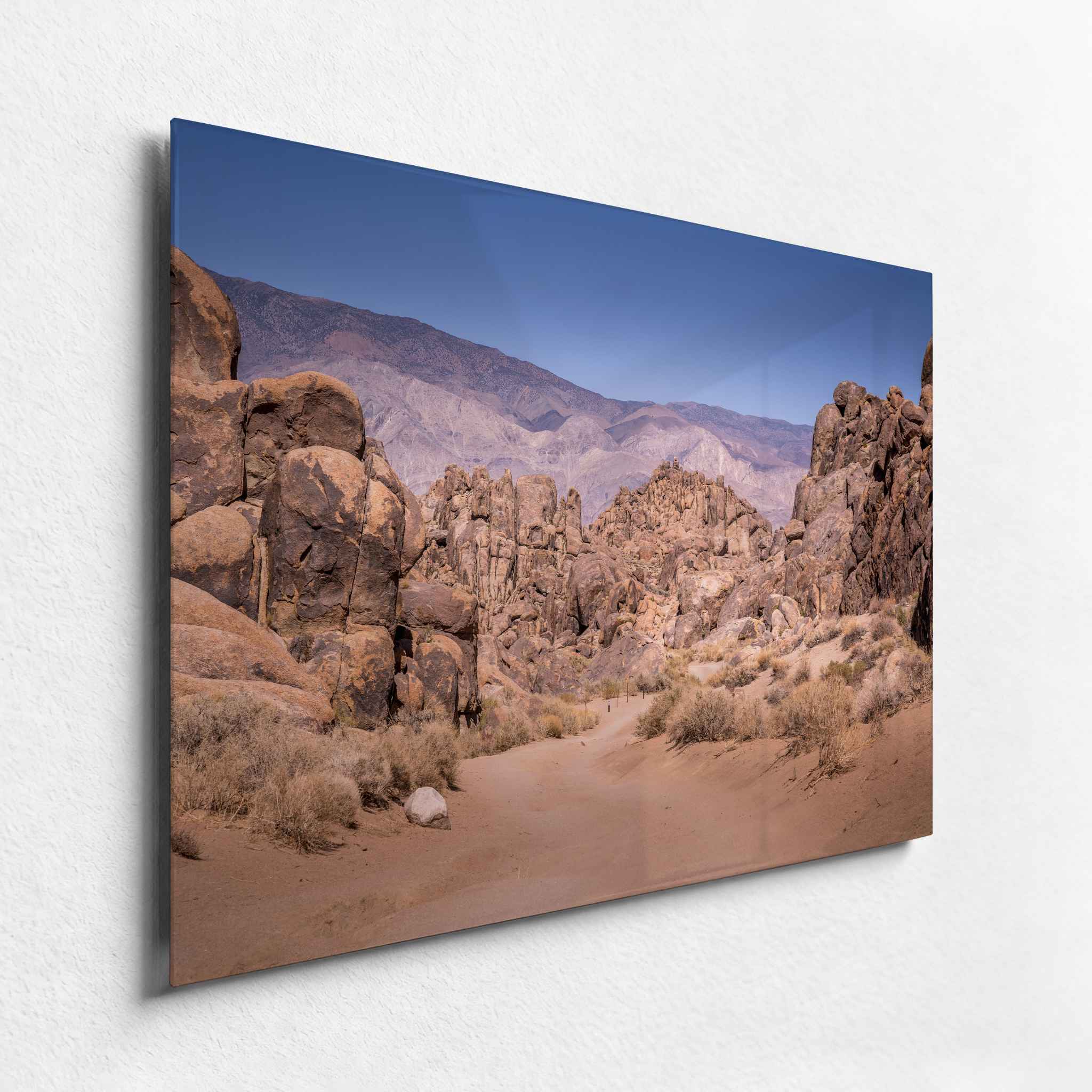 Alabama Hills California landscape HD metal print shown from an angled side view, highlighting the slim frameless profile and glossy finish.