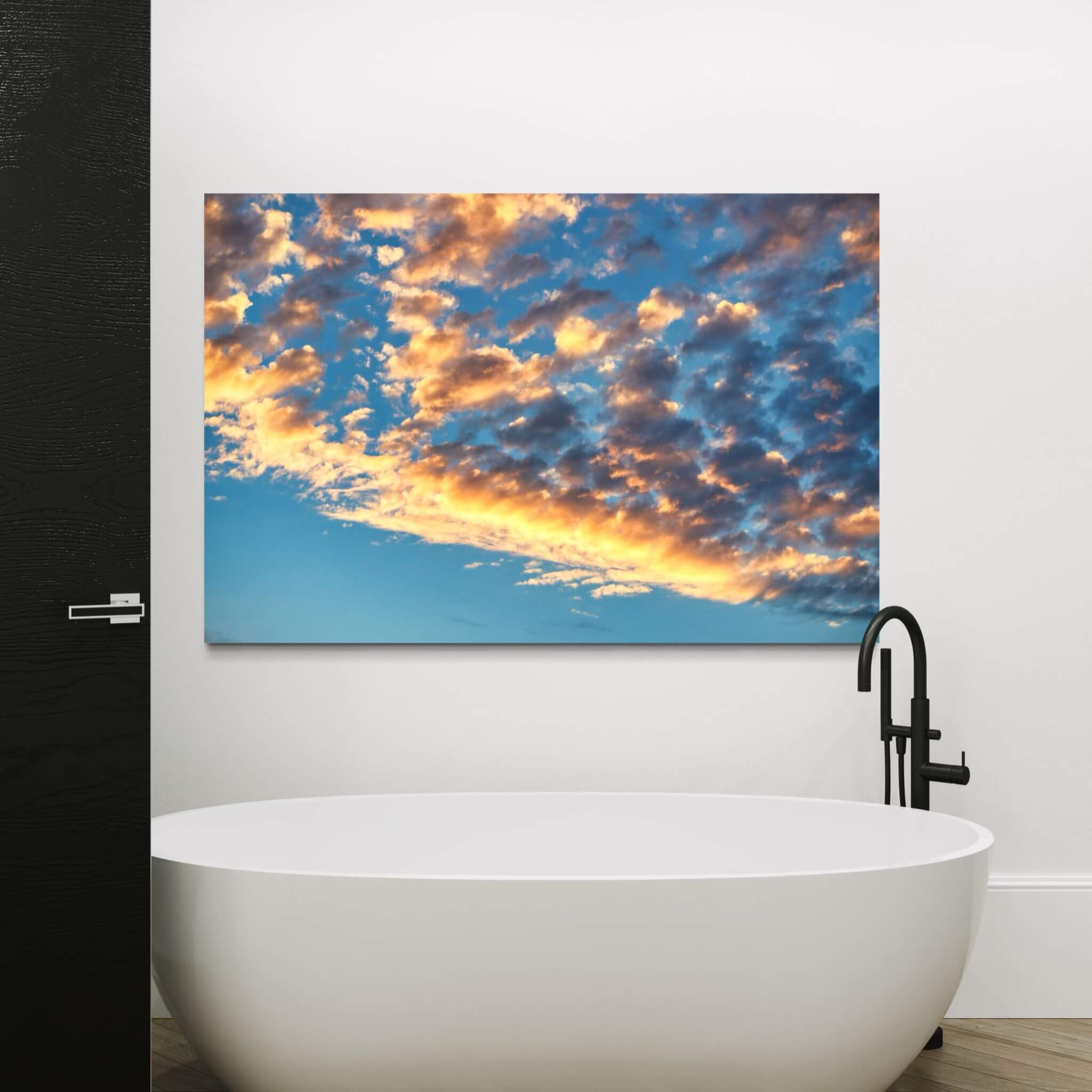 Blue and Gold Symphony metal wall art displayed above a freestanding bathtub in a modern black and white bathroom. Photographed by Abigail Diane Photography.