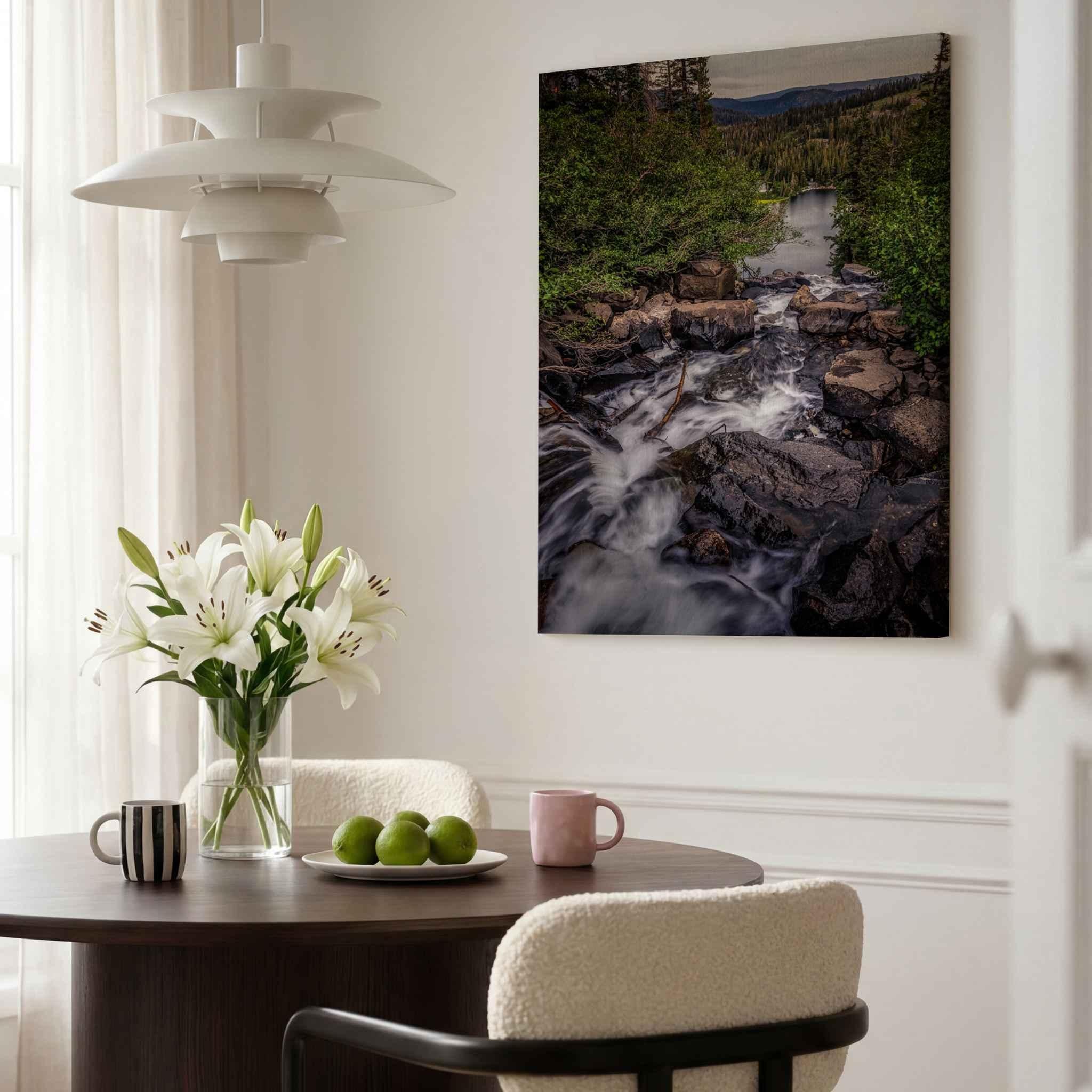 Cascading Into Stillness canvas print of Twin Falls in Mammoth Lakes, California, displayed in a bright modern dining room.