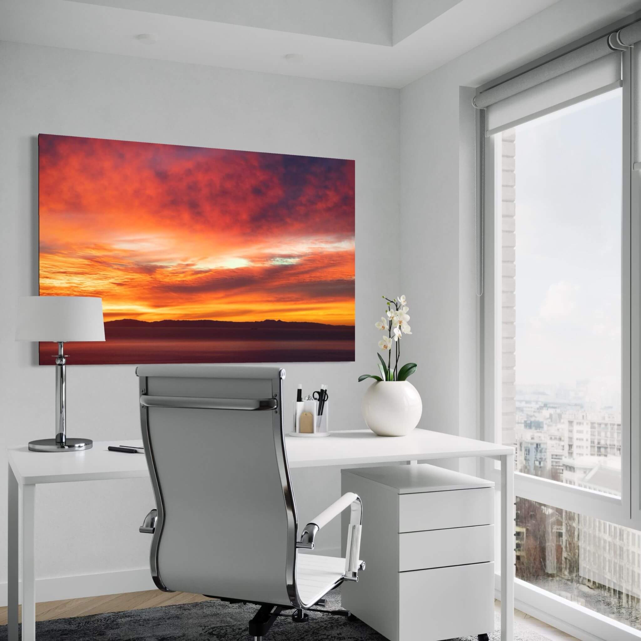 Catalina Beneath Crimson Skies metal wall art displayed in a bright modern home office, bringing vibrant sunset color into the neutral interior. Photography by Abigail Diane Photography.