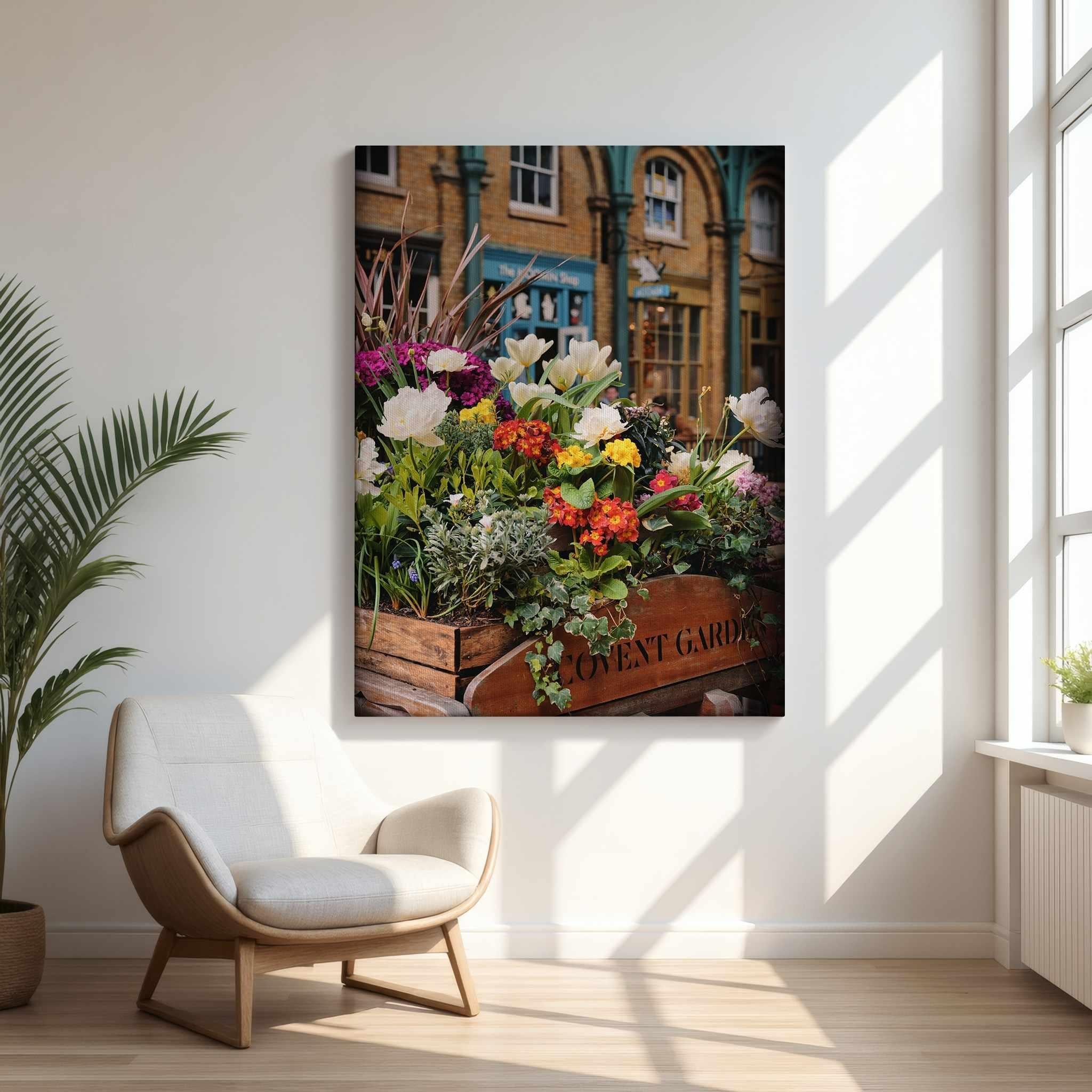 Covent Garden in Bloom by Abigail Diane Photography featuring vibrant seasonal flowers at Covent Garden in London, England. Fine art canvas wall art displayed in a bright, modern living room with warm natural light, light wood floors, and minimalist décor.