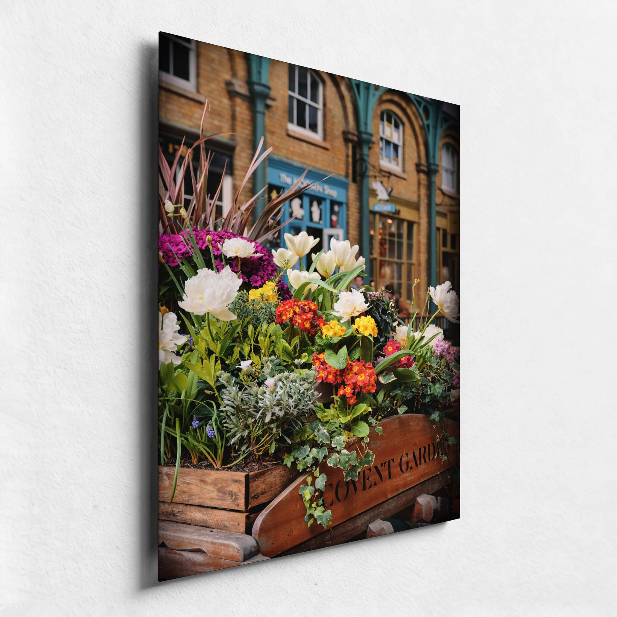 Covent Garden in Bloom fine art print close-up featuring colorful spring flowers and the historic architecture of Covent Garden in London.