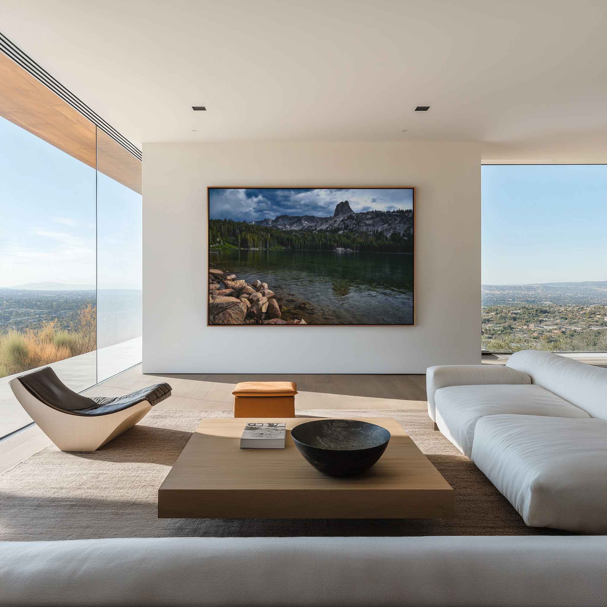 Eastern Sierra mountain lake photography displayed as large wall art in a contemporary living room with neutral furnishings and expansive windows.