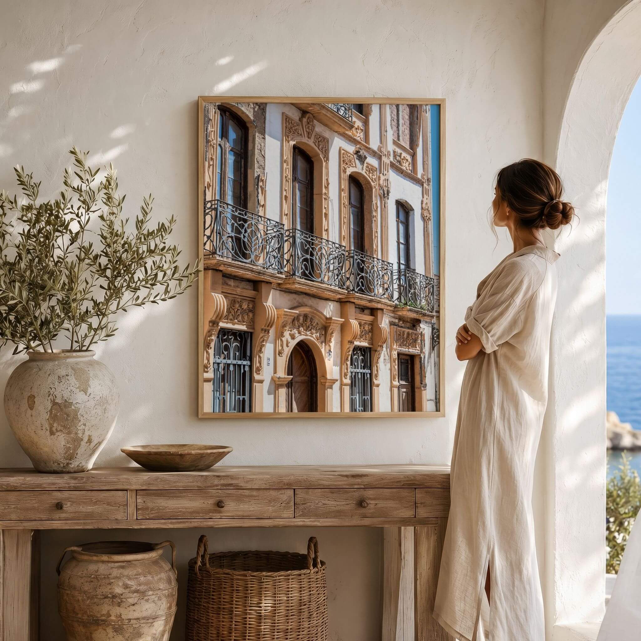 Elegance of Ronda framed fine art print displayed in a warm Spanish-inspired interior, featuring ornate wrought-iron balconies and historic architecture in Ronda, Spain – Abigail Diane Photography