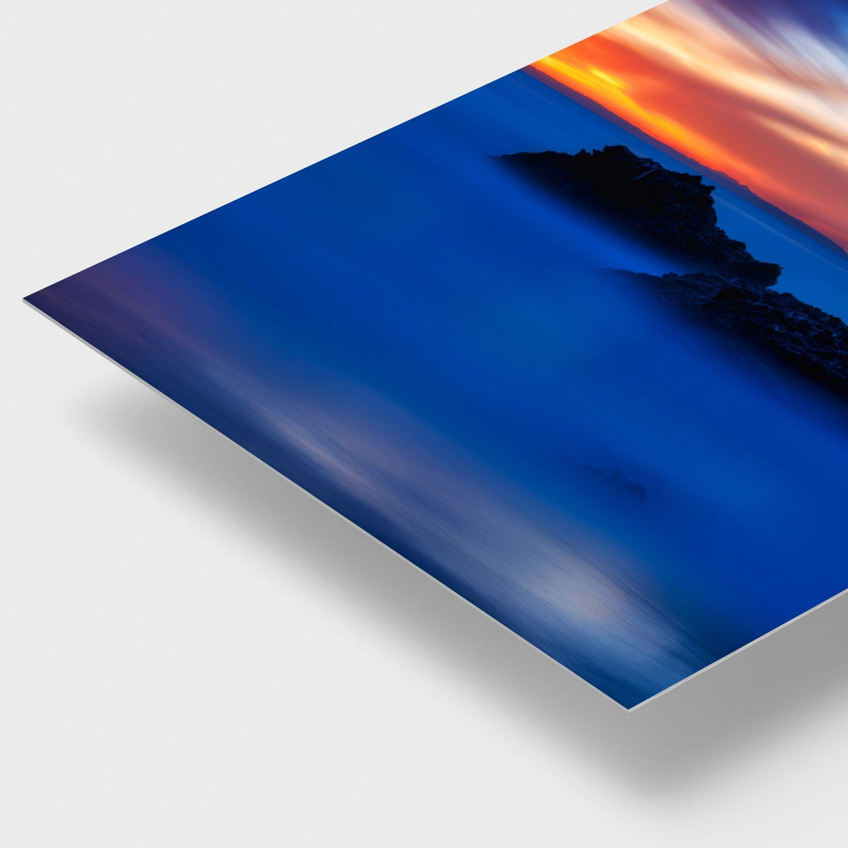 Escape to a Mystical Blue Hour dye-sublimation metal print by Abigail Diane Photography showcasing vibrant blue-hour tones, glowing sunset skies, silky ocean water, and rugged coastal sea stacks at Laguna Beach, California.