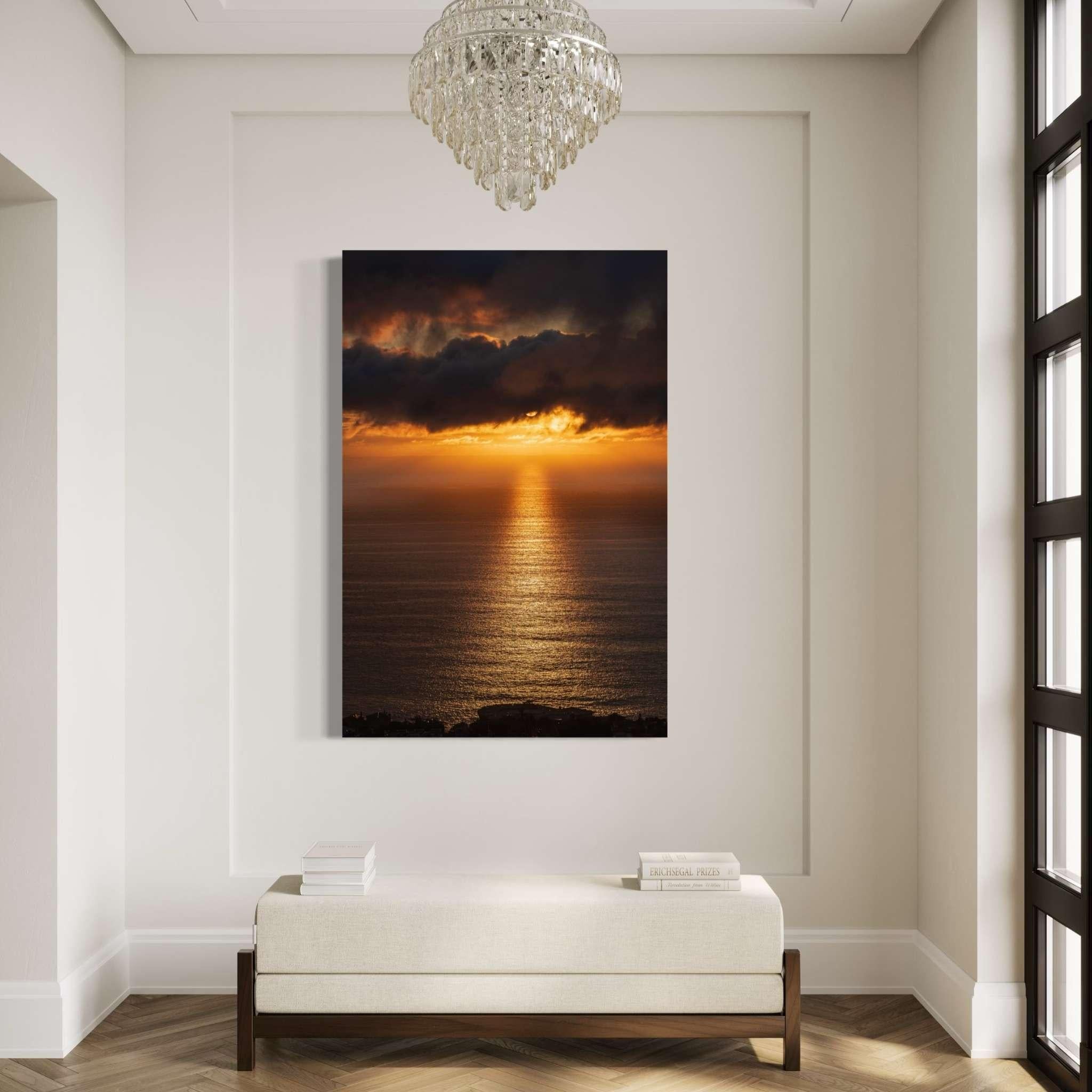 Golden Rays on the Mirrored Sea of the Pacific by Abigail Diane Photography displayed as a large luxury canvas print in a modern entryway with dramatic sunset ocean photography and elegant coastal home décor.