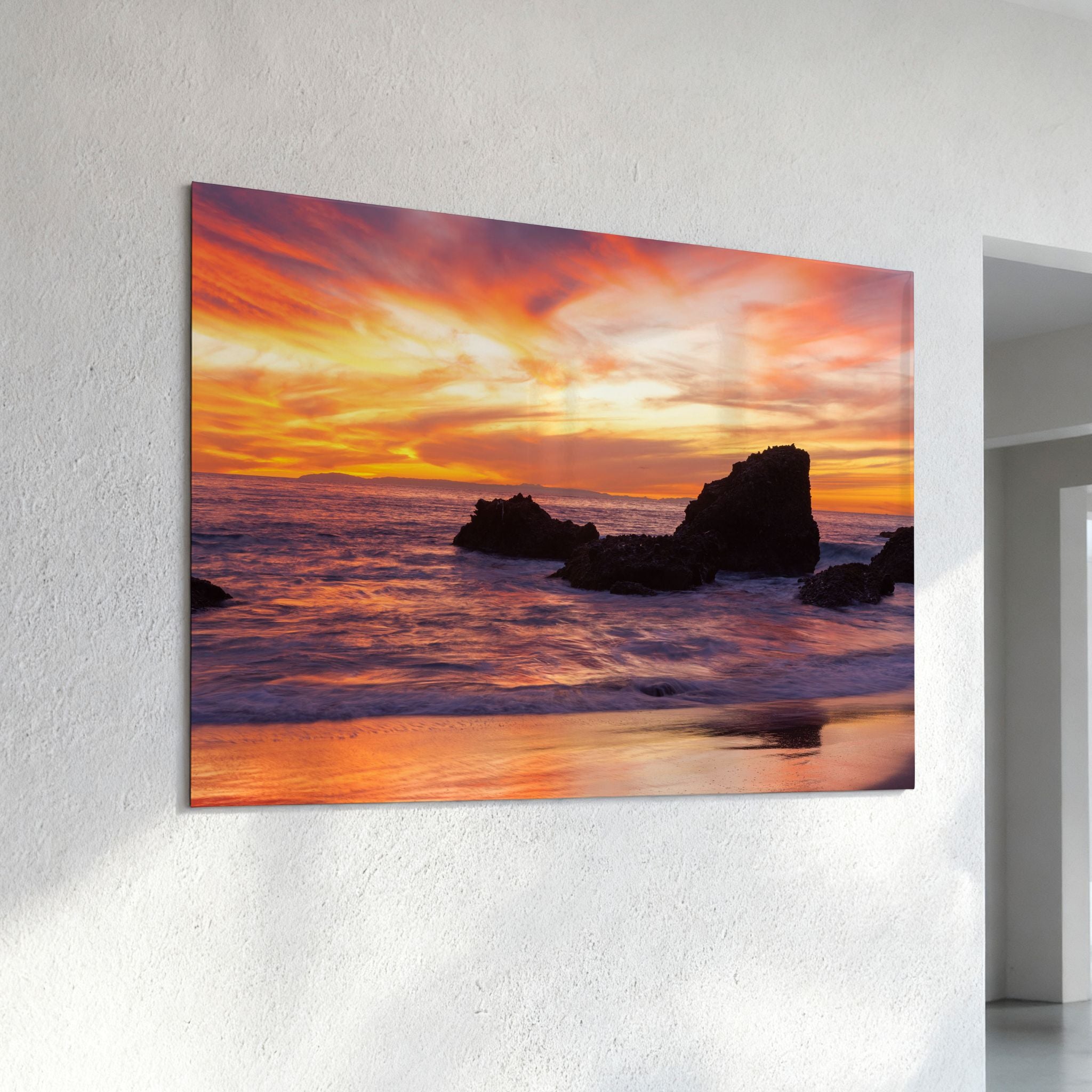 Laguna Beach sunset metal wall art featuring Woods Cove Beach, glowing ocean reflections, dramatic sea stacks, and colorful California coastal skies by Abigail Diane Photography.