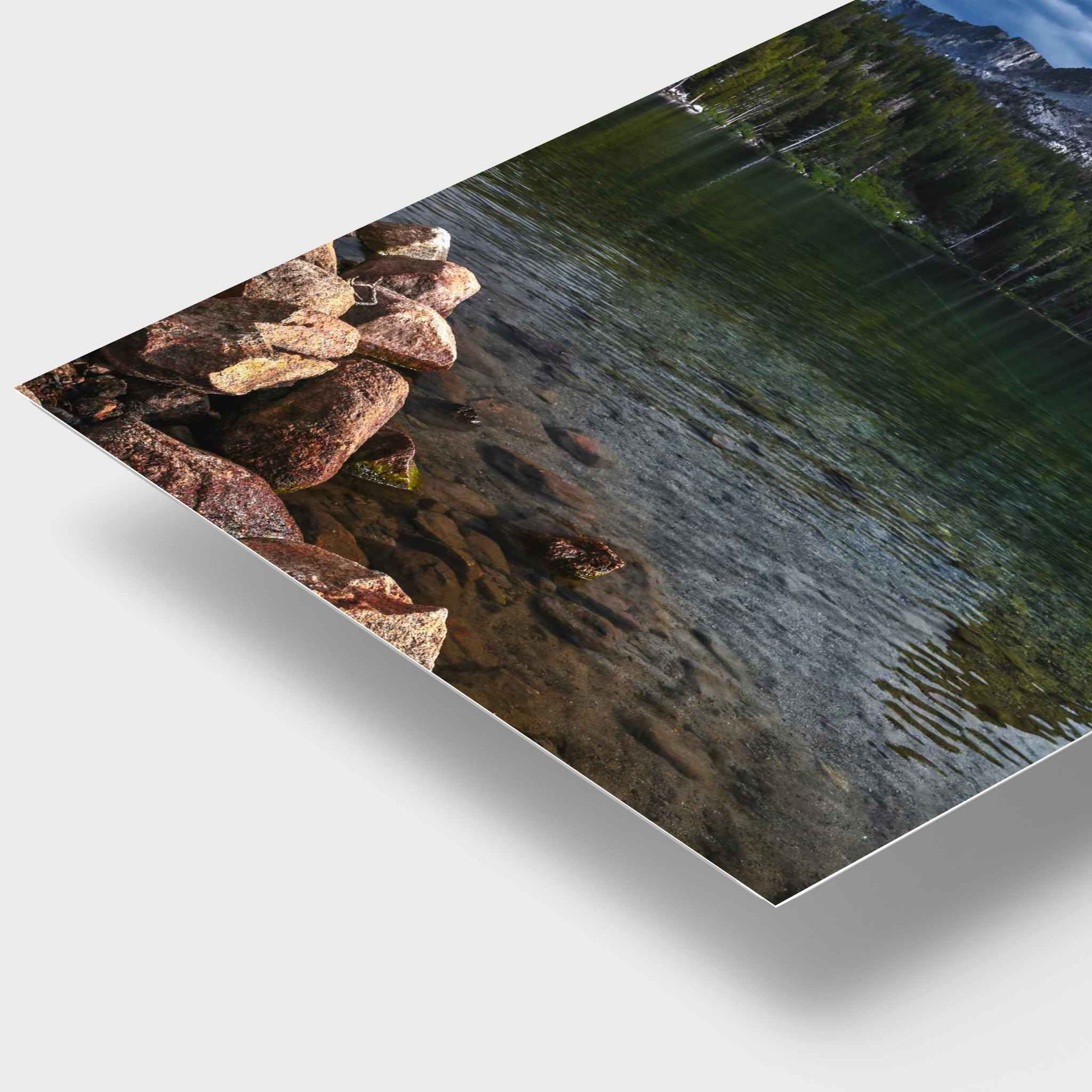 Reflections on Lake Mary HD metal print close-up showing crystal-clear alpine water, rocky shoreline, pine forest, and rugged mountains in Mammoth Lakes, California’s Eastern Sierra.