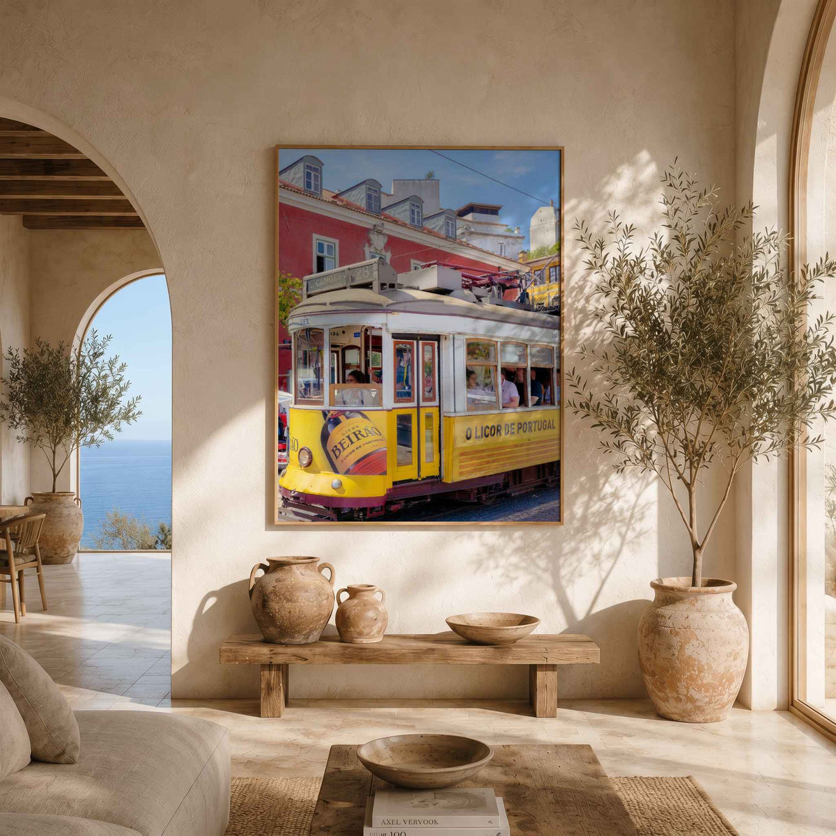 Riding Through Lisboa fine art print featuring a classic yellow tram displayed in a warm Mediterranean-inspired interior.