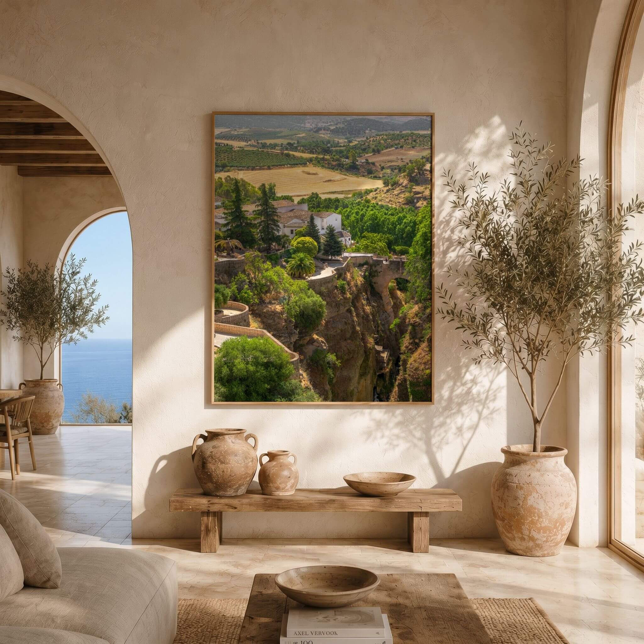 Ronda Above the Gorge framed fine art print displayed in a warm Mediterranean-style interior, featuring the dramatic El Tajo Gorge and surrounding Andalusian landscape in Ronda, Spain – Abigail Diane Photography