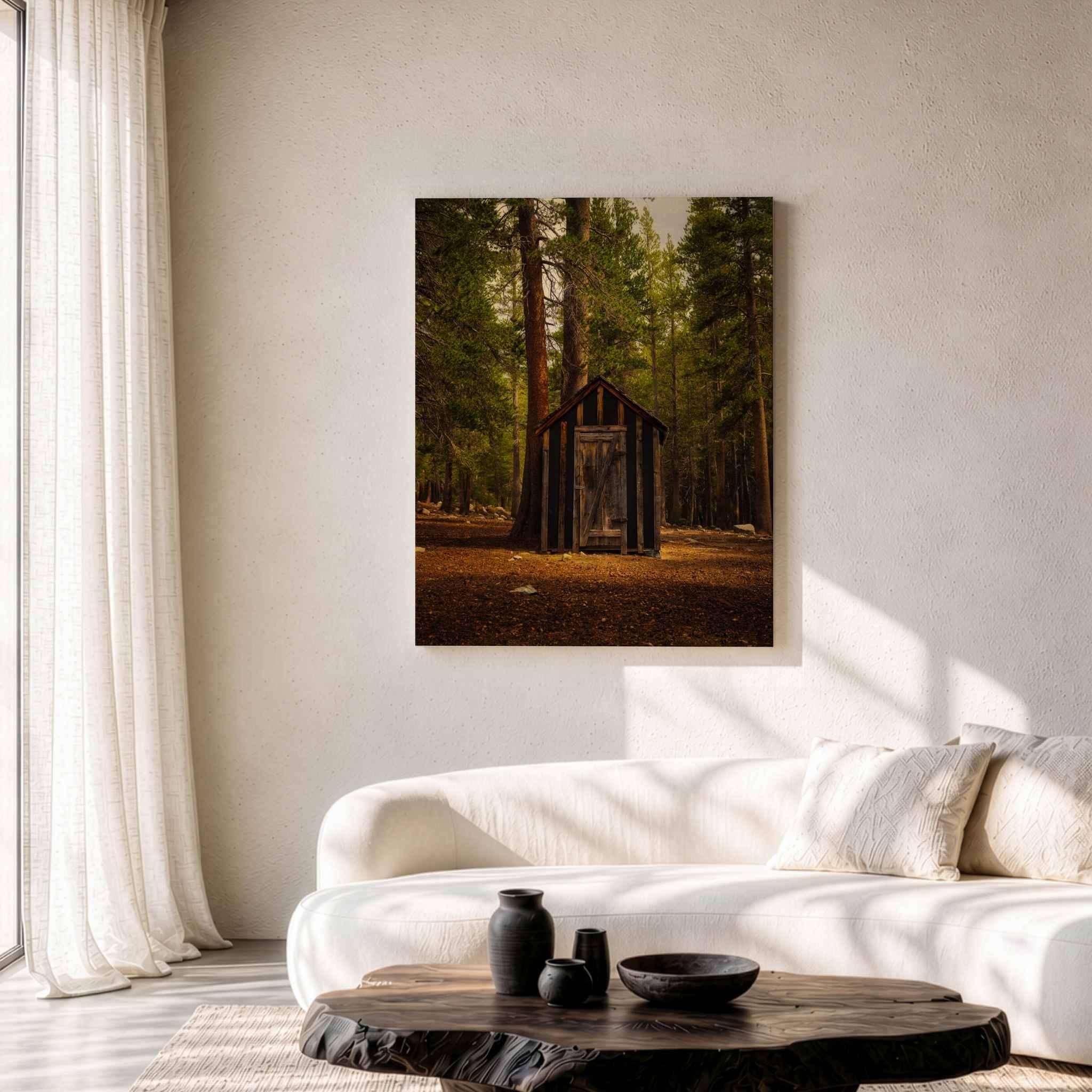 Rustic Remnant Among the Trees metal print displayed above a white sofa in a rustic contemporary living room with a dark natural wood table.