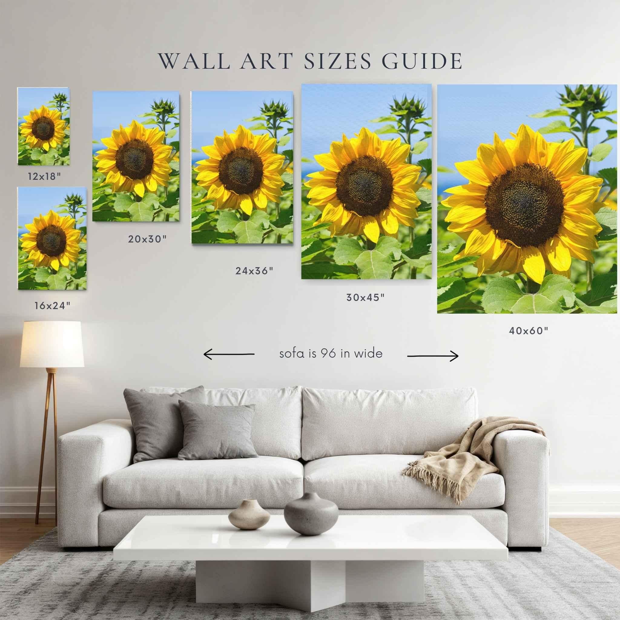 Turning toward the light sunflower canvas wall art size guide by Abigail Diane Photography showing fine art print, canvas, framed print and metal print sizes above a 96-inch sofa for scale.