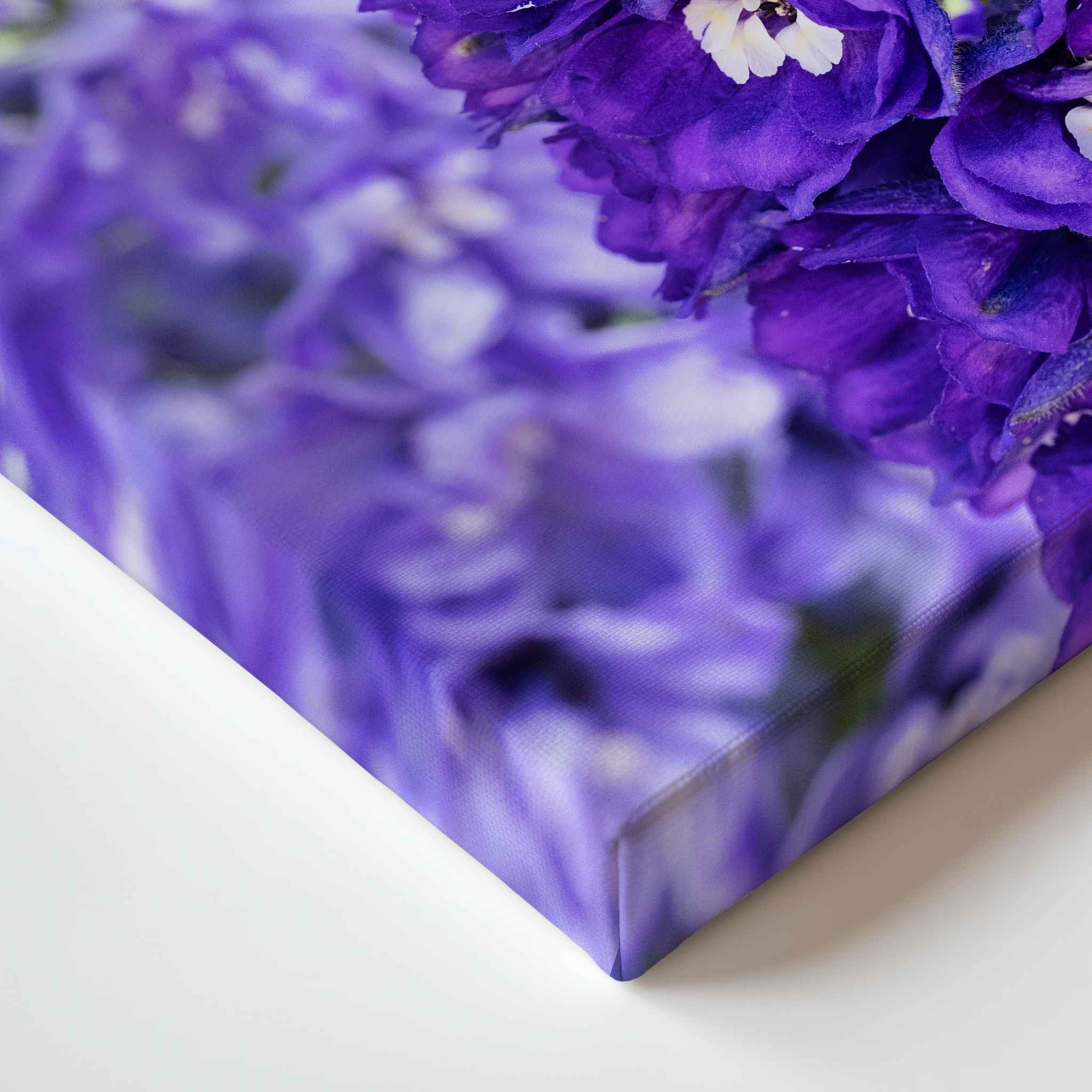 Violet Harmony purple larkspur canvas print detail showing the gallery-wrapped corner and vibrant violet floral tones by Abigail Diane Photography.