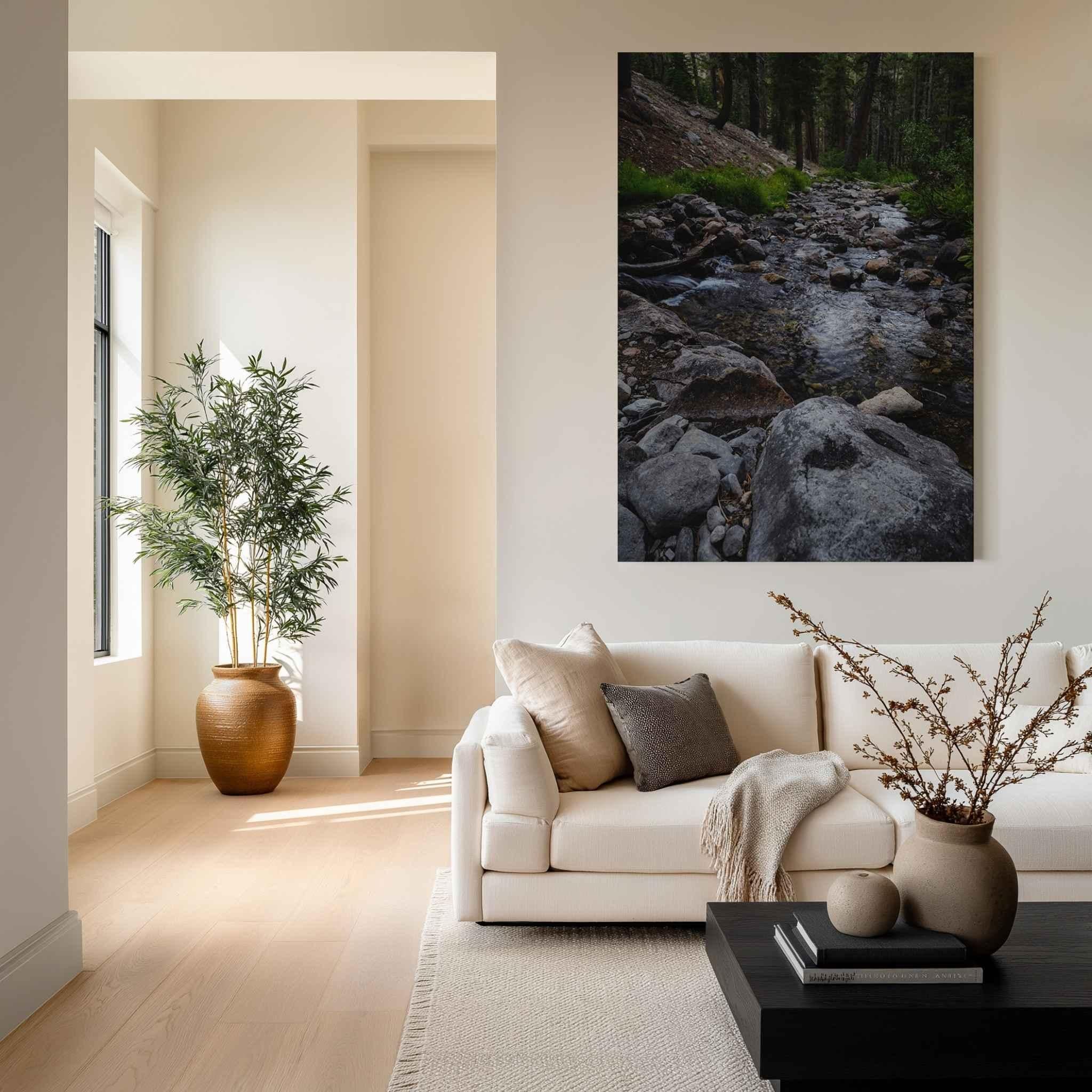 Where the Stepping Stones Lead HD metal print featuring a rocky forest stream in Mammoth Lakes, California, displayed in a warm neutral modern living room.