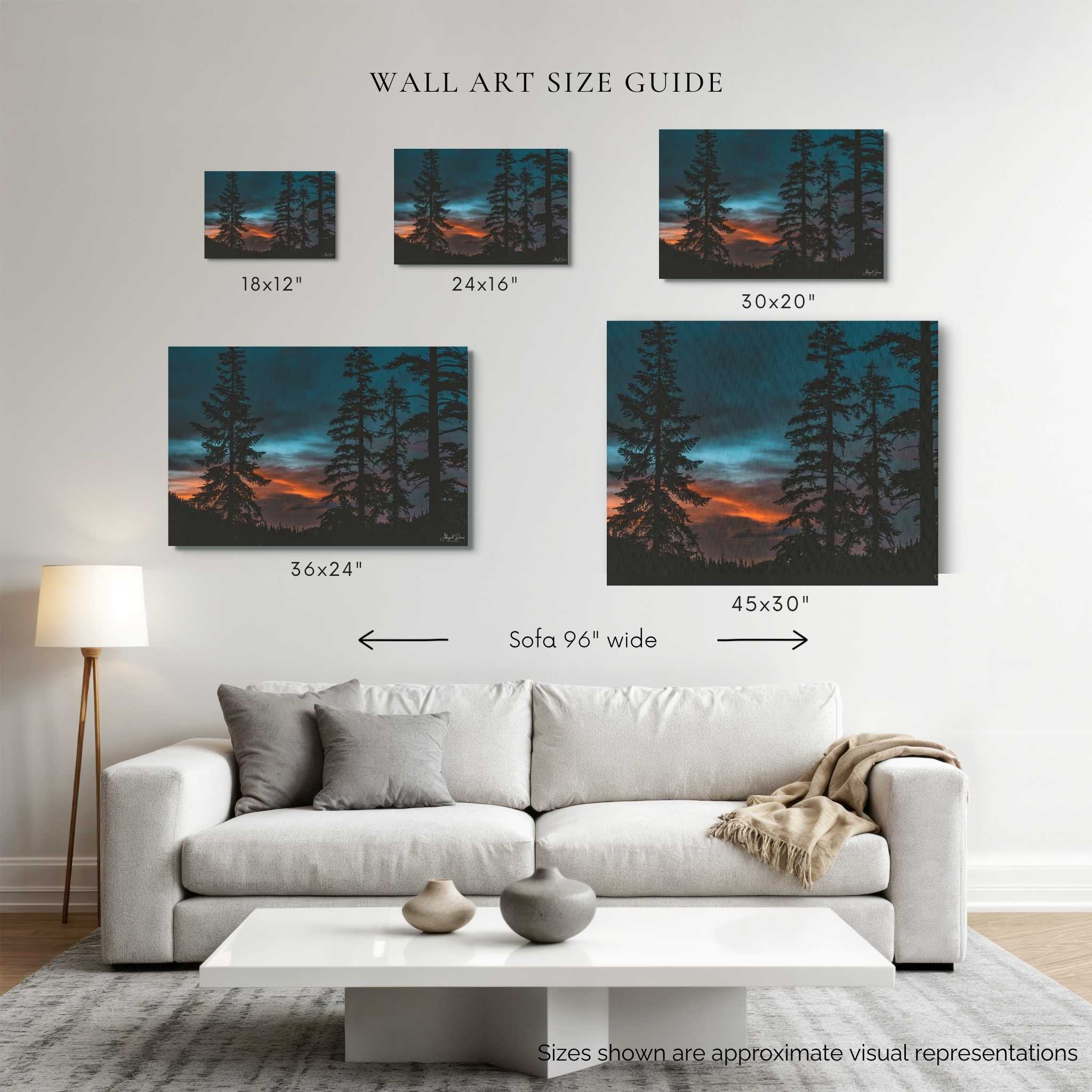 Wall art size guide showing blue-hour-among-the-pines-displayed above a 96-inch sofa in 18 × 12, 24 × 16, 30 × 20, 36 × 24, and 45 × 30 inch canvas sizes by Abigail Diane Photography.