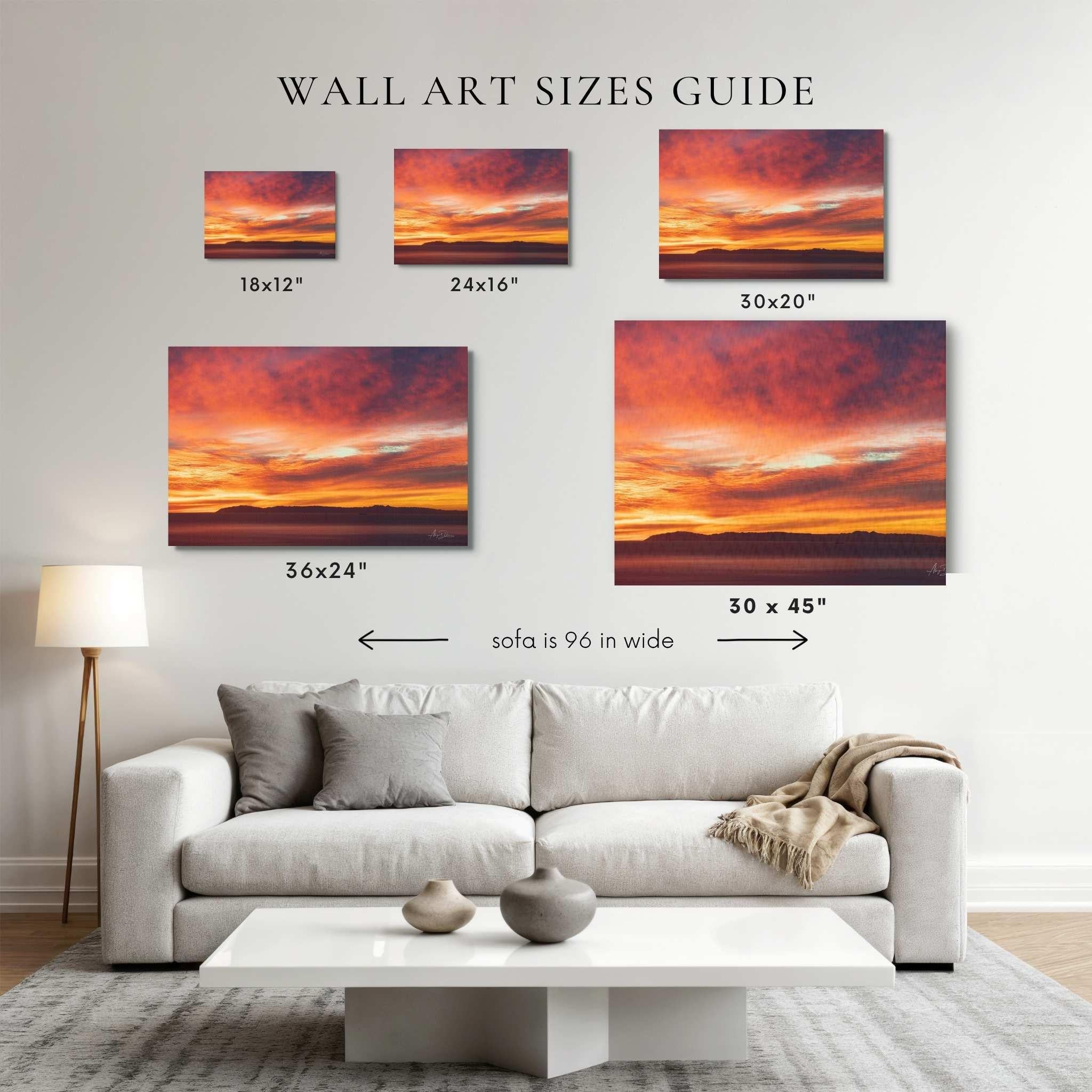 Wall art size guide showing Catalina Island beneath crimson skies wall art displayed above a 96-inch sofa in 18 × 12, 24 × 16, 30 × 20, 36 × 24, and 45 × 30 inch canvas sizes by Abigail Diane Photography.