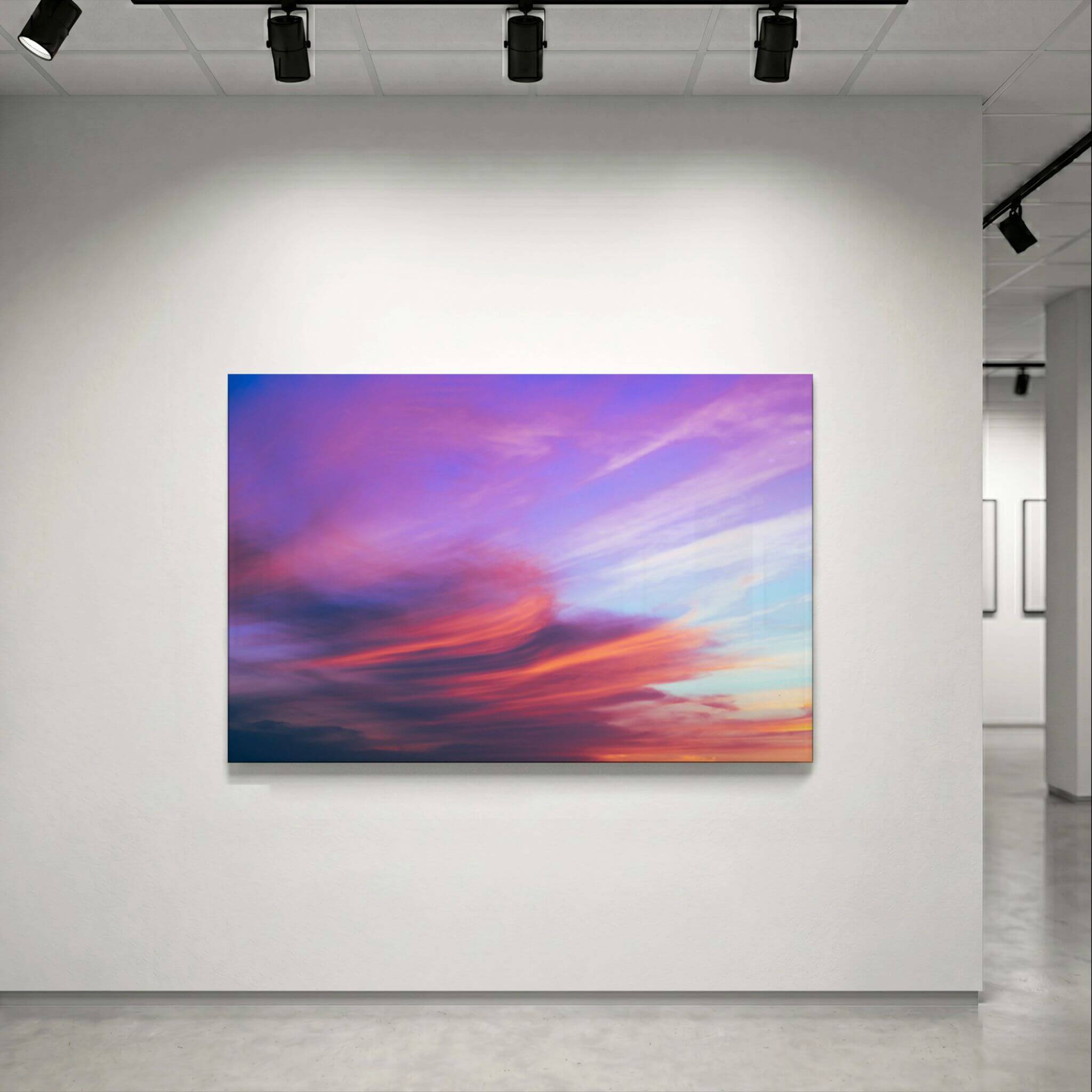 Lavender Dreams HD metal print displayed in a contemporary gallery setting, showcasing sweeping lavender, coral, pink, and blue sunset clouds with exceptional color and clarity by Abigail Diane Photography.