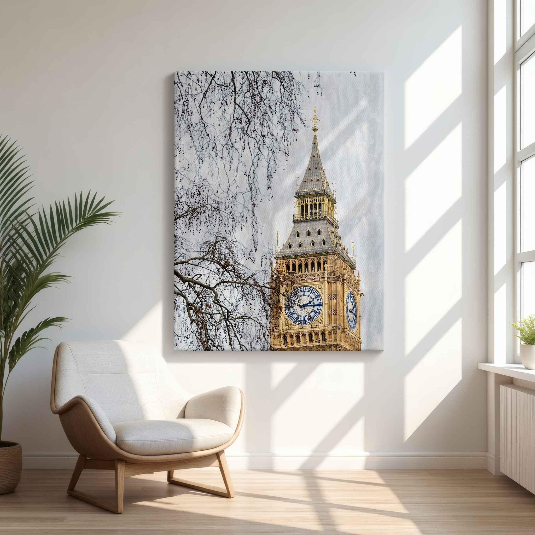  Big Ben. Elizabeth Tower in London, England, framed by delicate tree branches. Fine art canvas wall art displayed in a bright, modern living room with warm natural light, light wood floors, and minimalist décor.
