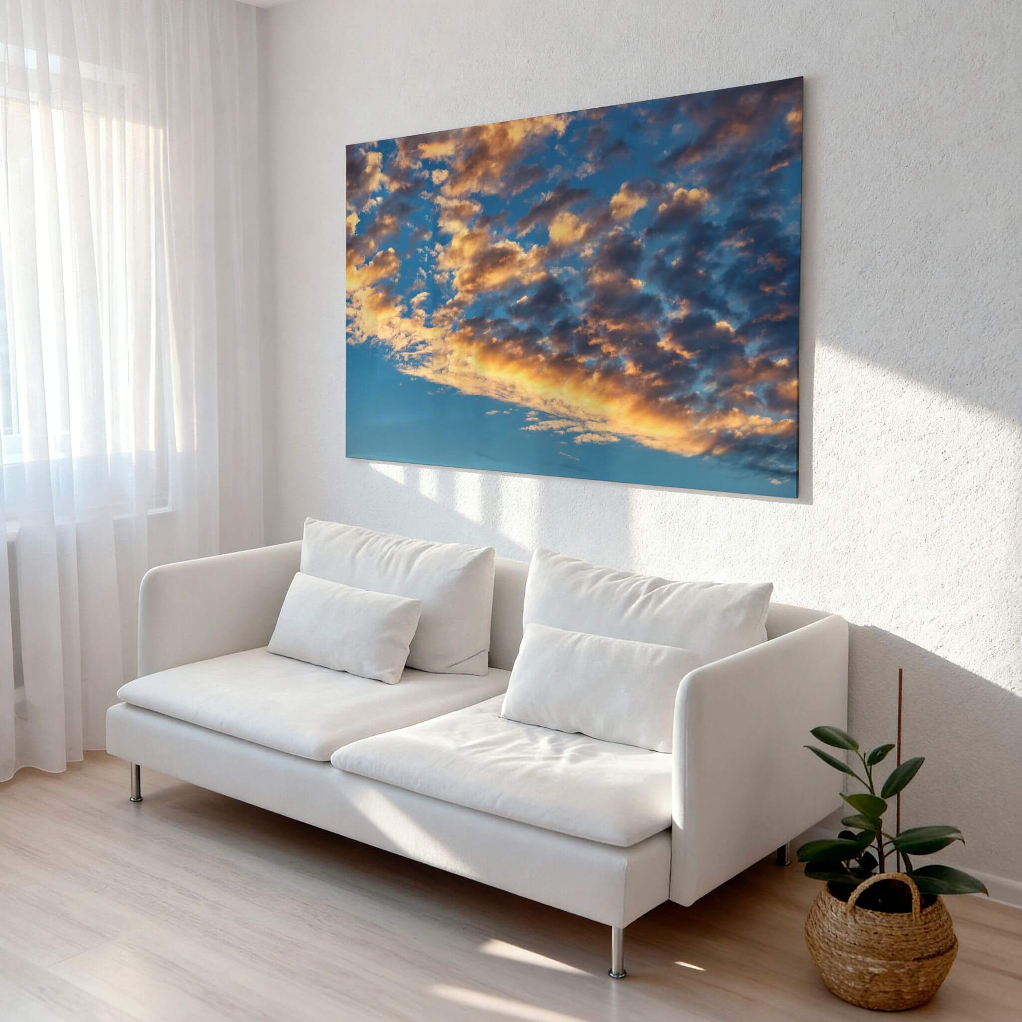 Blue and Gold Symphony metal wall art displayed above a white sofa in a bright minimalist living room with natural light. Photography by Abigail Diane Photography.