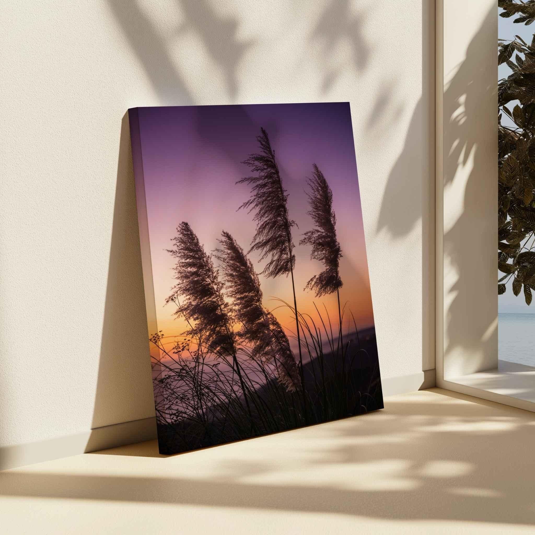 California coastal pampas grass sunset wall art by Abigail Diane Photography displayed in a serene beach house interior overlooking the ocean, with warm sunset tones and coastal décor.