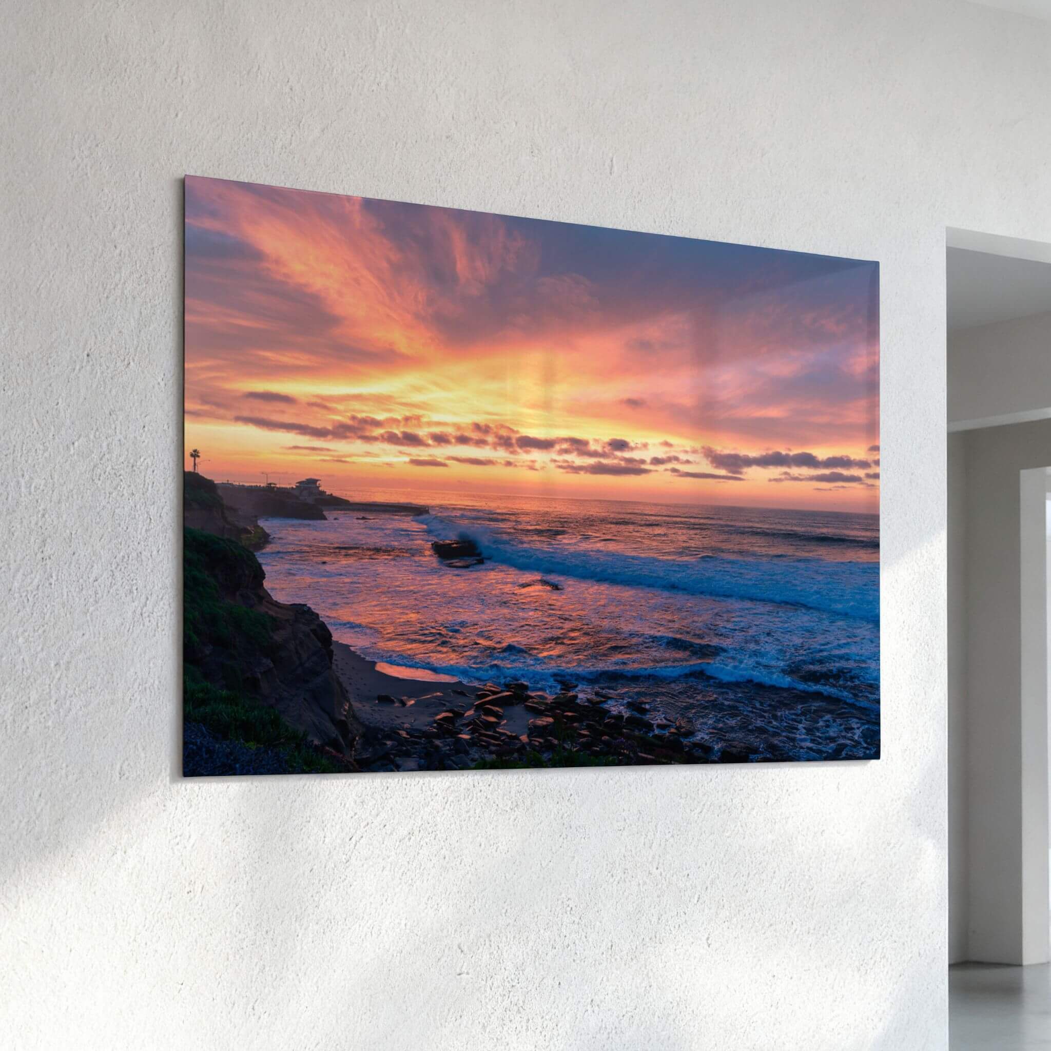 Candy Floss Sunset metal wall art featuring a vibrant pink and peach sunset over the Pacific Ocean in Laguna Beach, California.