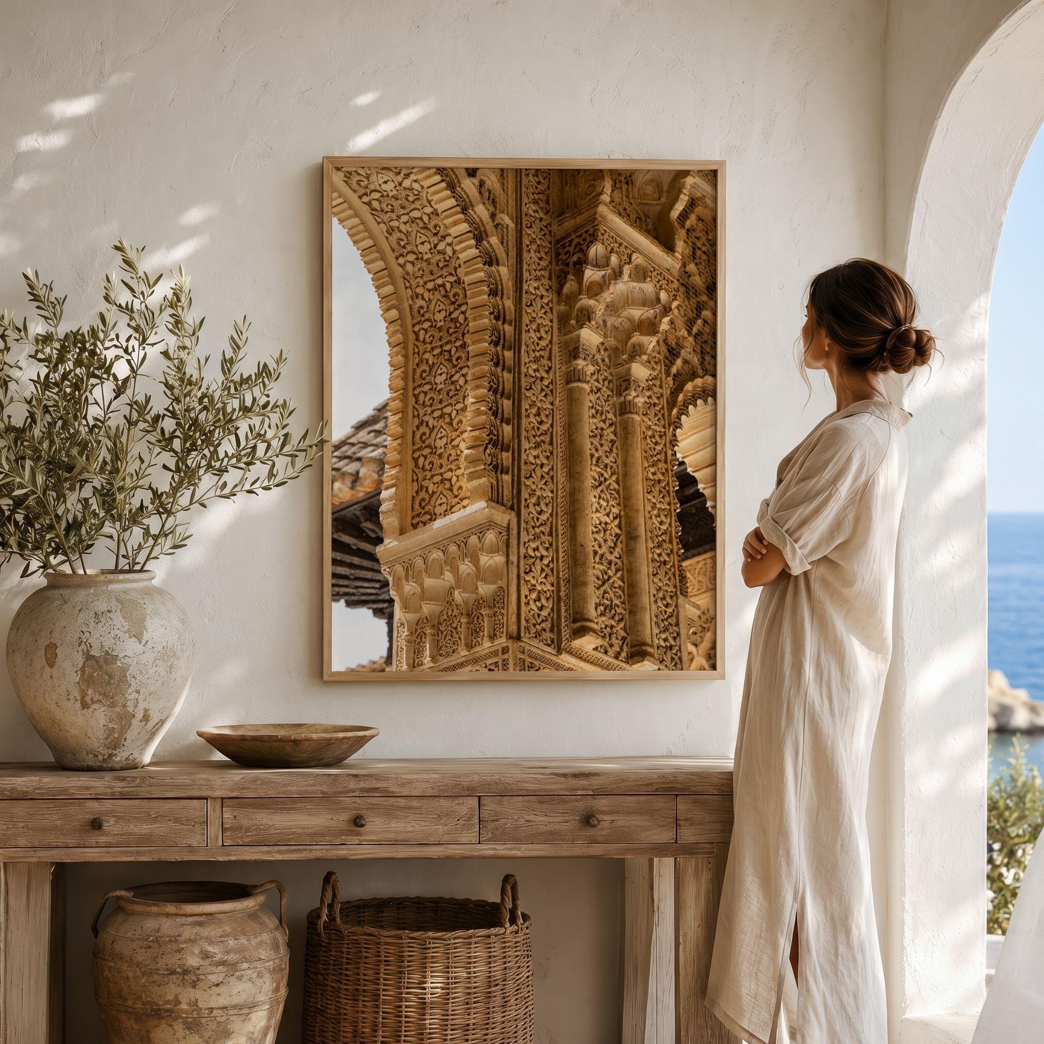Carved Arches of the Alhambra framed fine art print displayed in a warm Spanish-inspired interior, featuring intricate Nasrid Palace carvings and arches in Granada, Spain – Abigail Diane Photography