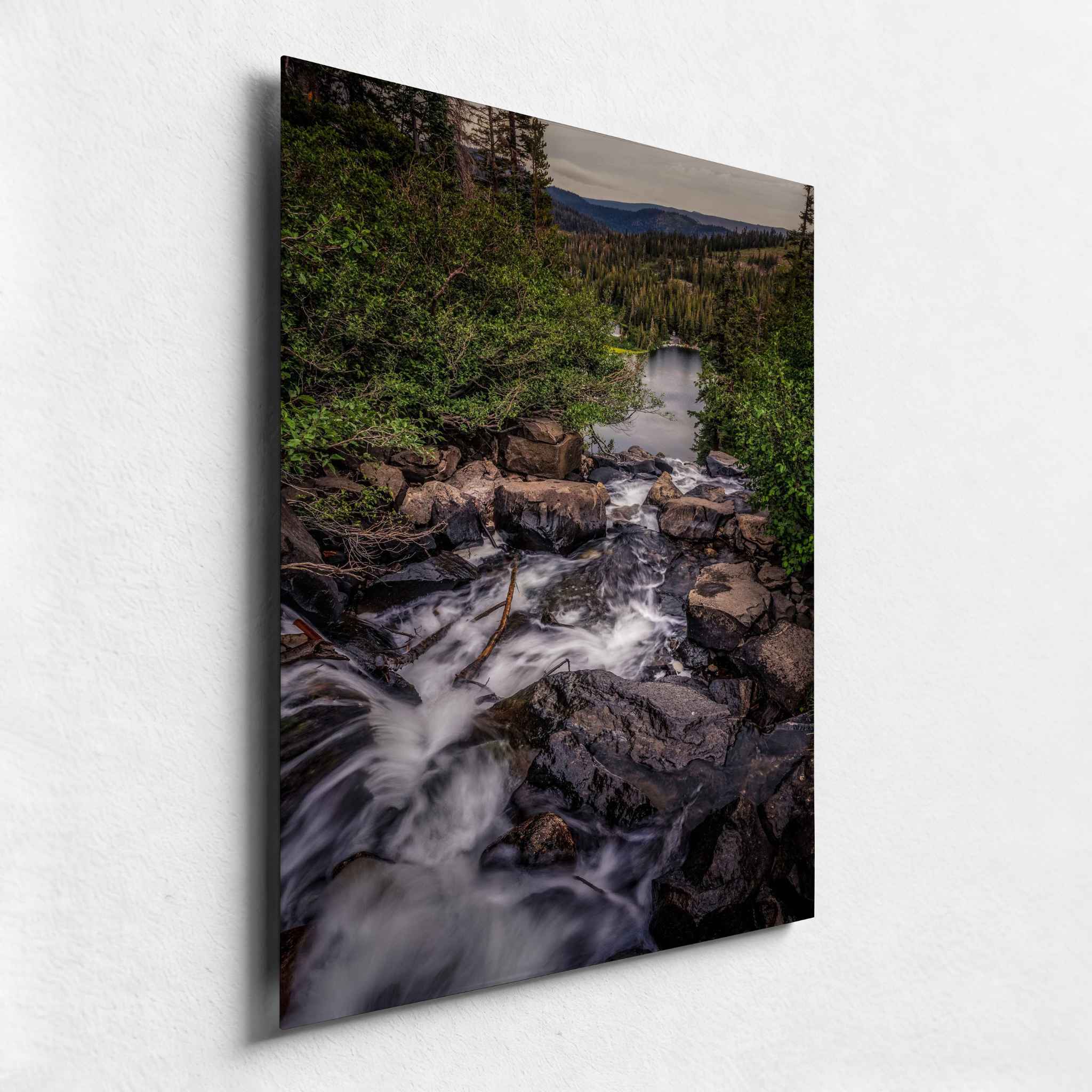Close-up angled view of Cascading Into Stillness HD metal print featuring flowing water cascading over rocks toward Twin Lakes in Mammoth Lakes, California.