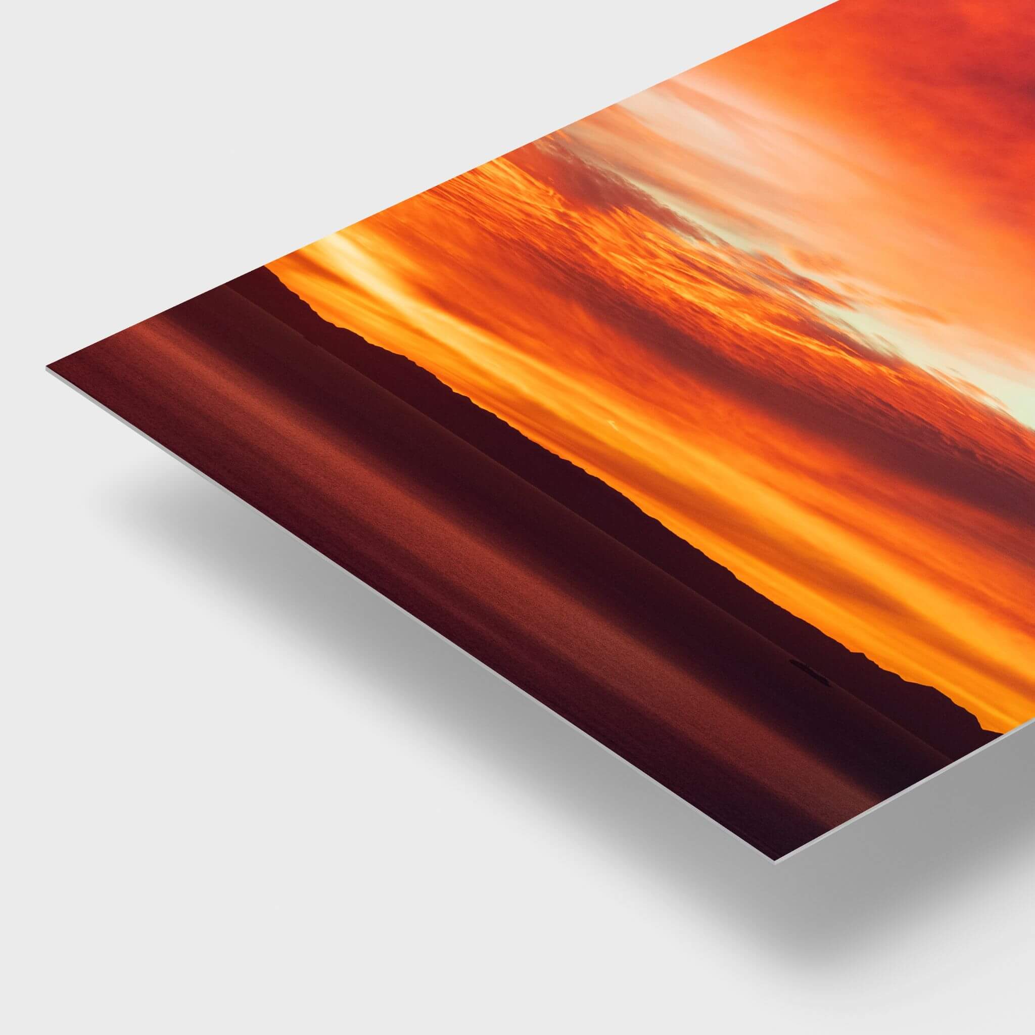 Catalina Beneath Crimson Skies dye-sublimation metal print detail showcasing vivid crimson, orange and golden sunset tones over Catalina Island.