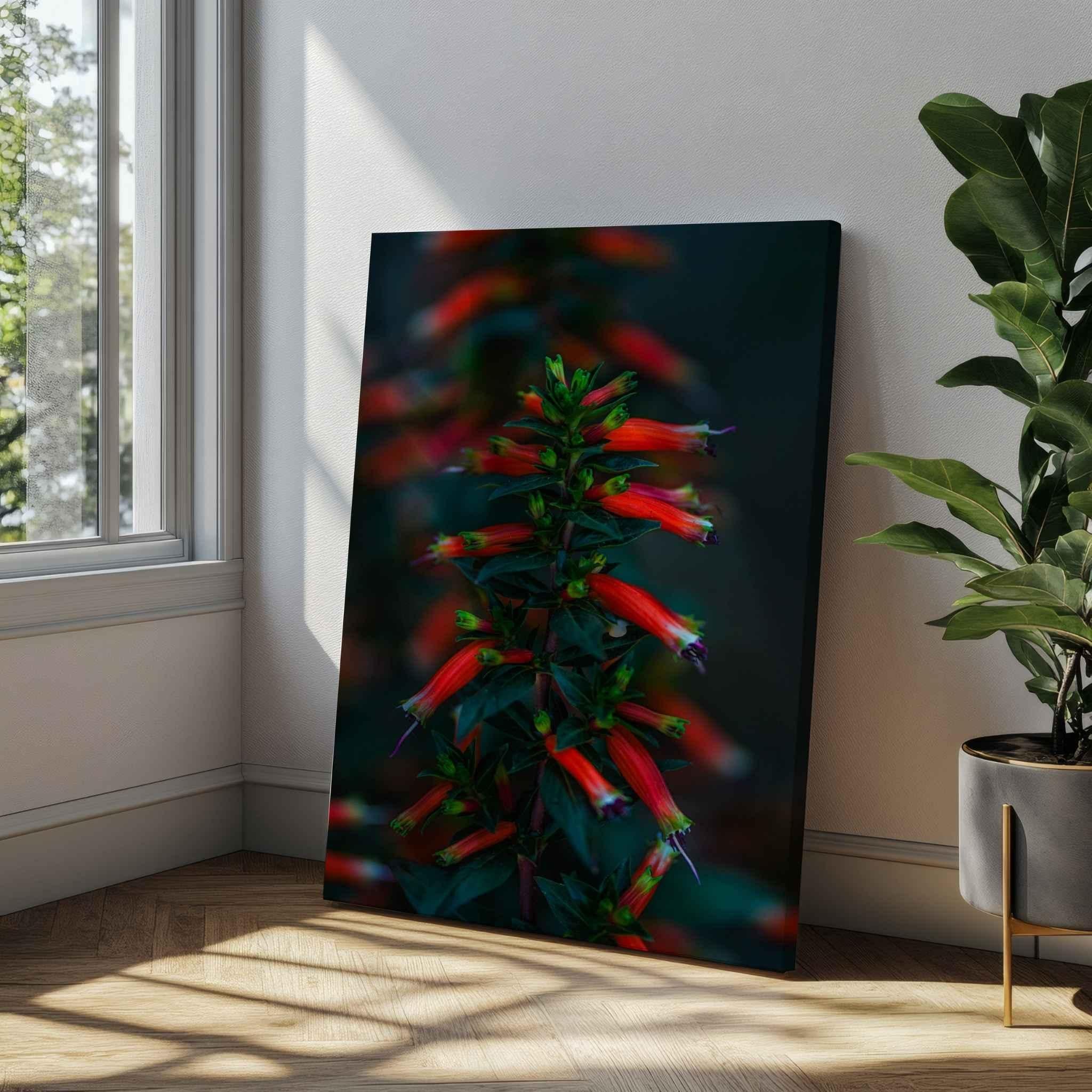 "Crimson Whispers at Twilight" by Abigail Diane Photography featuring vibrant red cigar flowers against a dark, dreamy background. Fine art canvas wall art displayed in a bright, modern room with warm natural light, light wood floors, and contemporary décor.