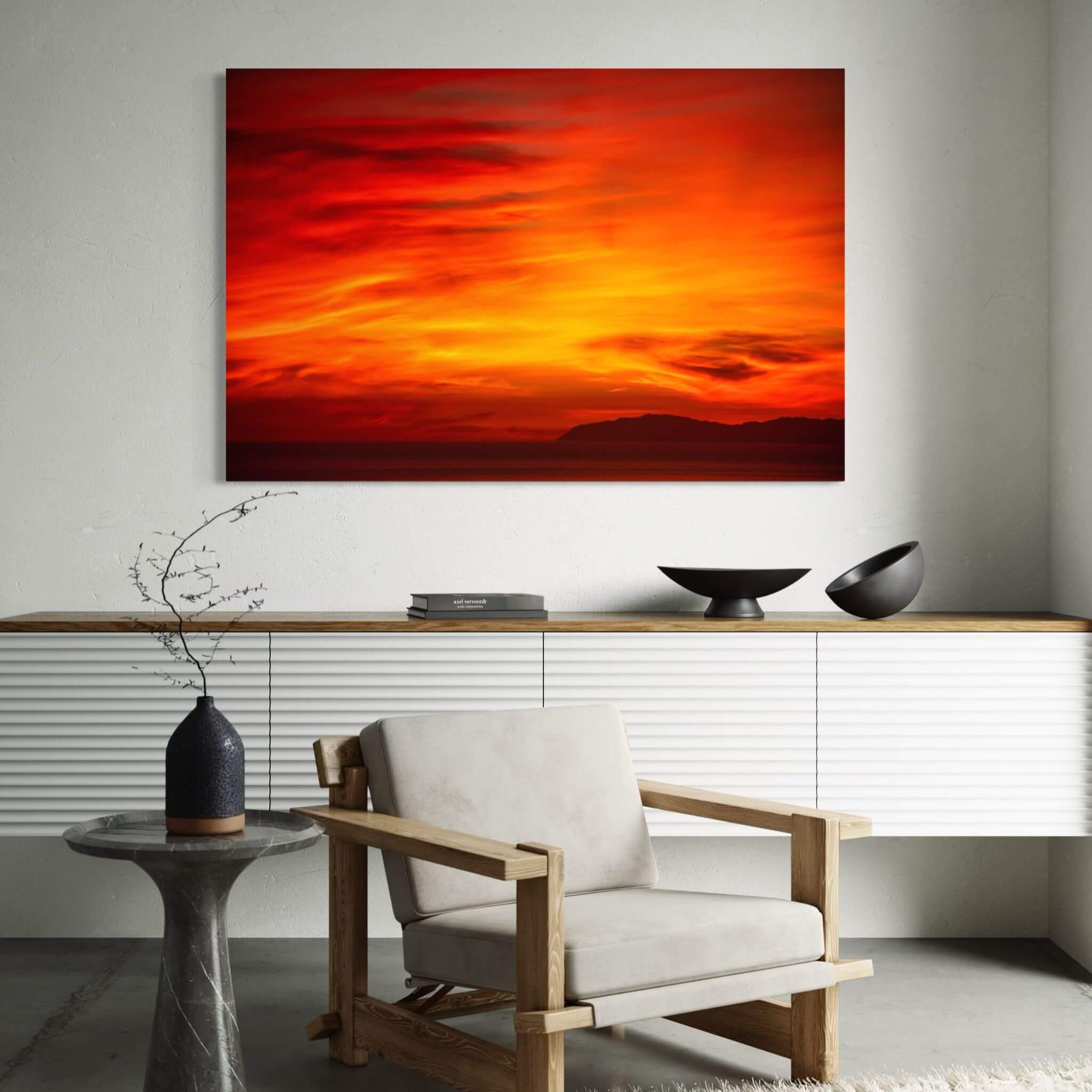 Inferno Sunset California sunset metal print displayed in a sophisticated neutral interior with natural wood and black accents. Photography by Abigail Diane Photography.