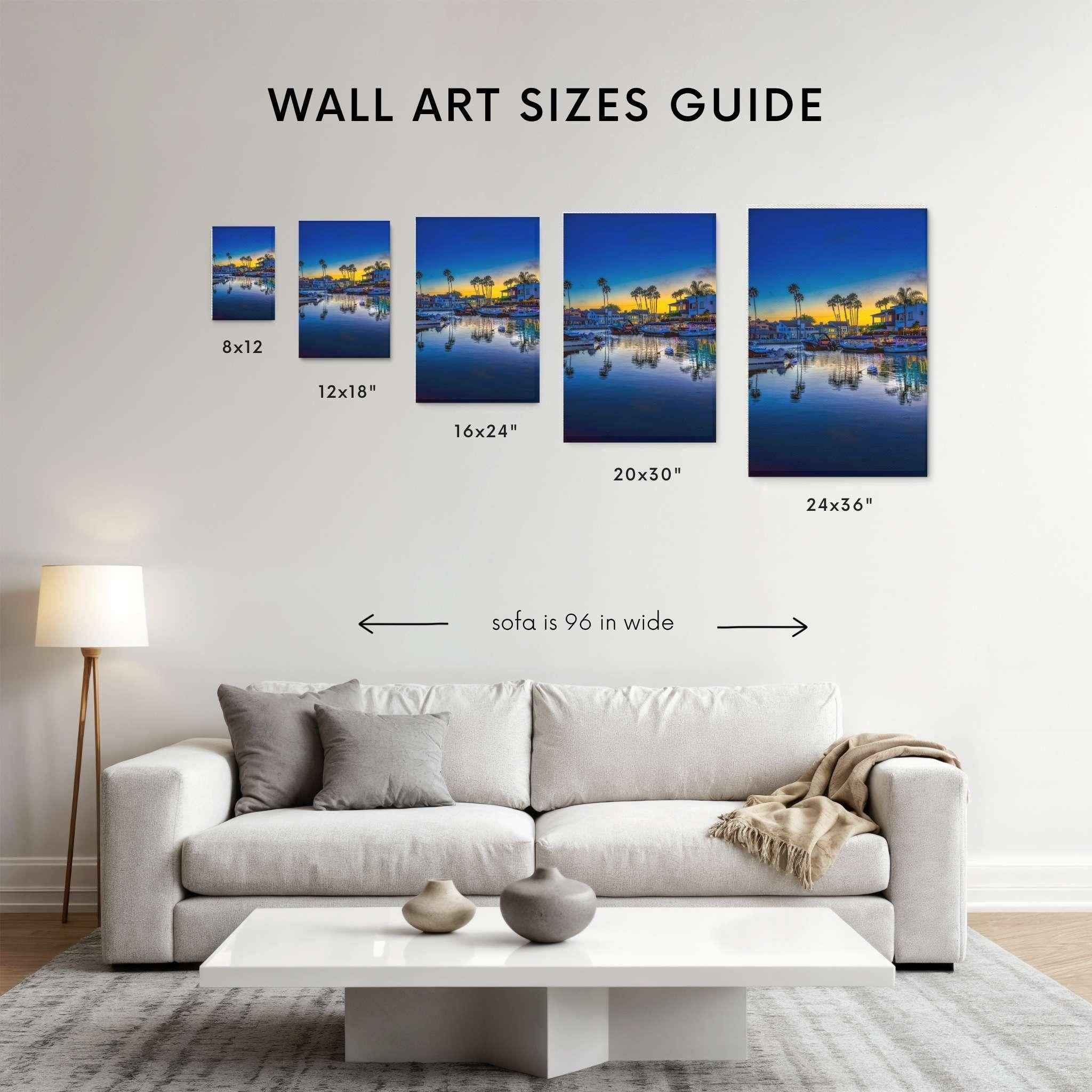 Magic of the Blue Hour wall art size guide showing 8 x 12, 12 x 18, 16 x 24, 24x36, 20 x 30 print sizes displayed above a 96-inch sofa for scale