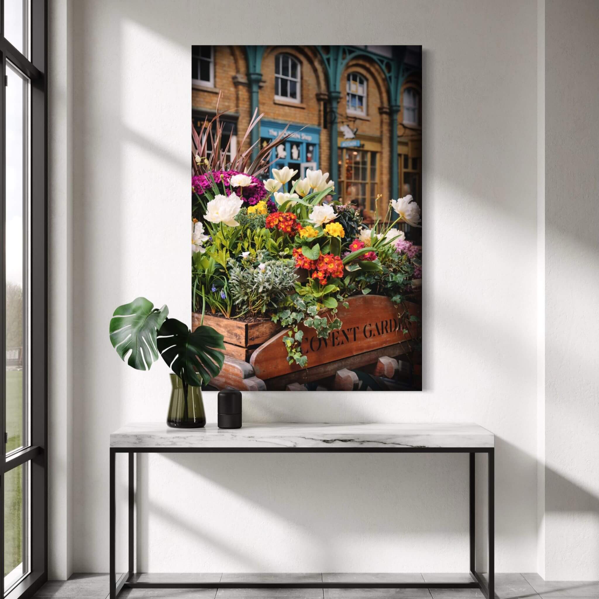 Covent Garden, London  in Bloom fine art print displayed above a marble console table in a bright modern interior with natural light.