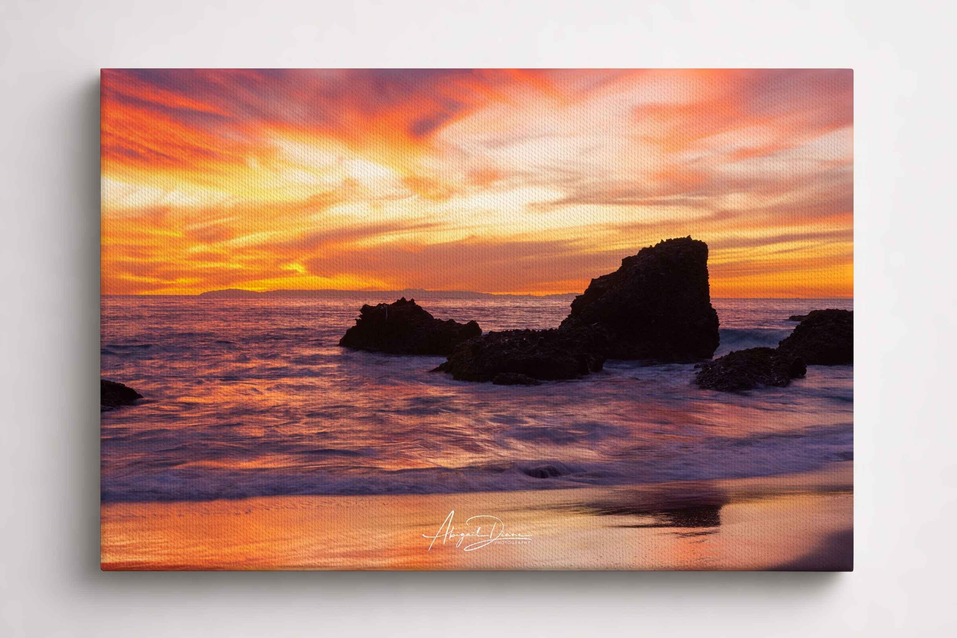 Sherbet Sunset gallery-wrapped canvas print featuring vibrant orange and pink sunset skies over the Pacific Ocean at Laguna Beach, California.