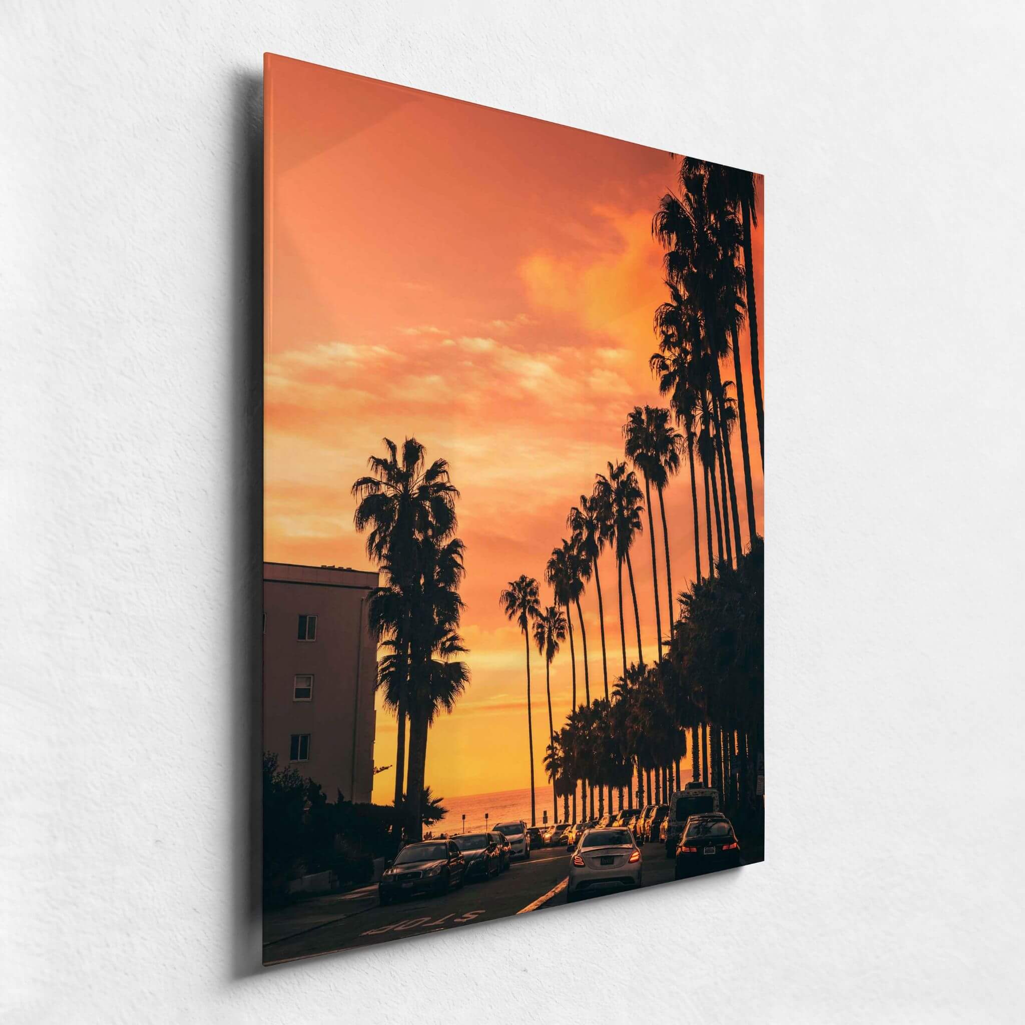 Close-up angled view of Sizzling Hot San Diego Nights metal print showing its sleek profile and vivid orange San Diego sunset photography.