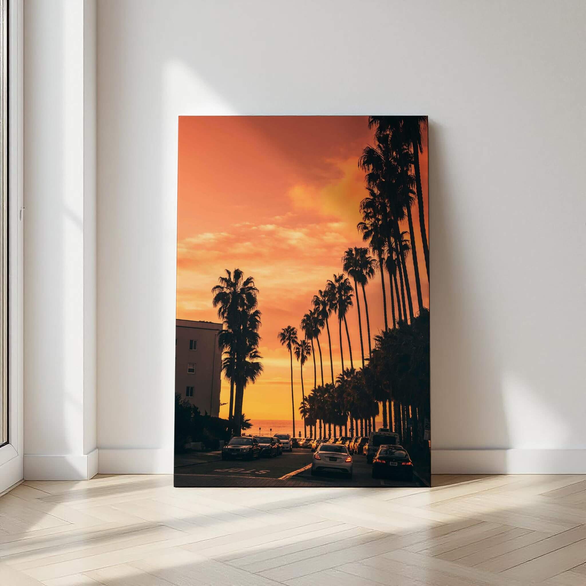 Sizzling Hot San Diego Nights metal print featuring a fiery palm-lined San Diego sunset displayed in a minimalist sunlit interior.