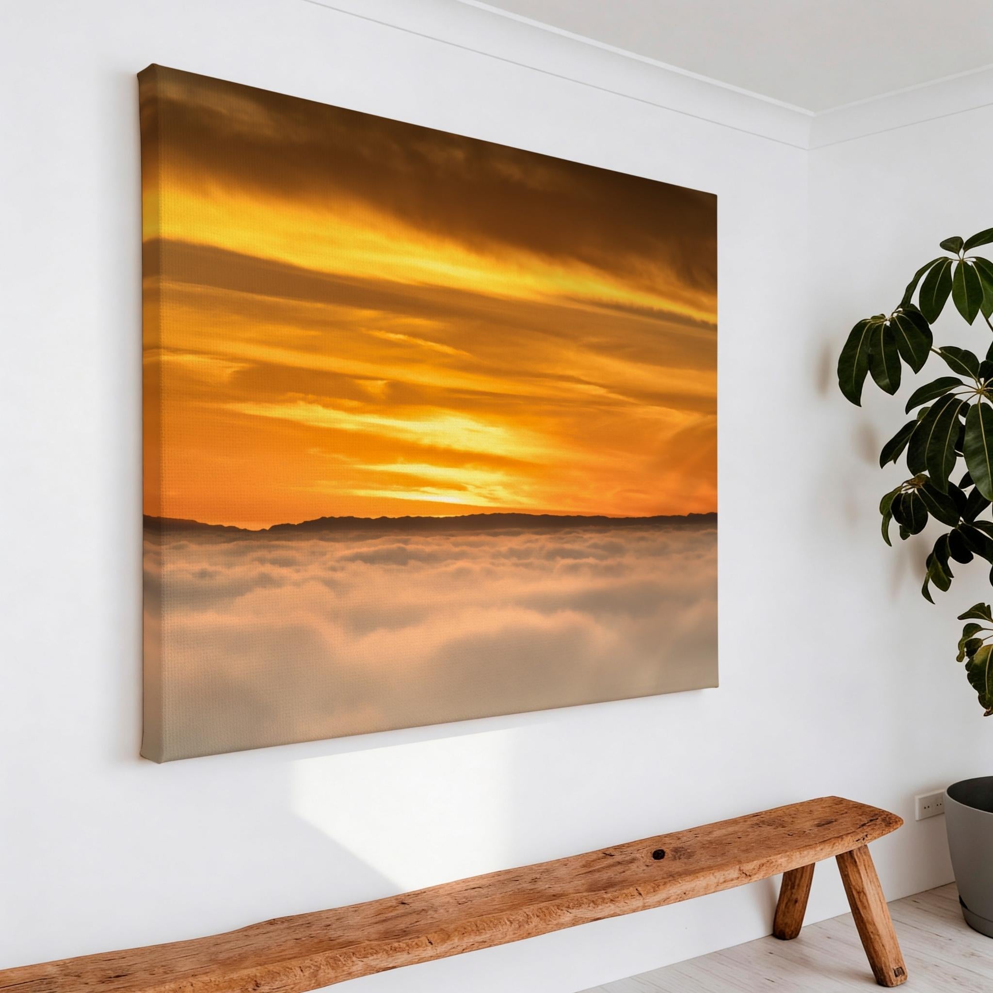Angled view of the Soaring Above the Clouds gallery-wrapped canvas showcasing the premium wrapped edges and golden winter sunset above a sea of clouds. Artwork by Abigail Diane Photography.
