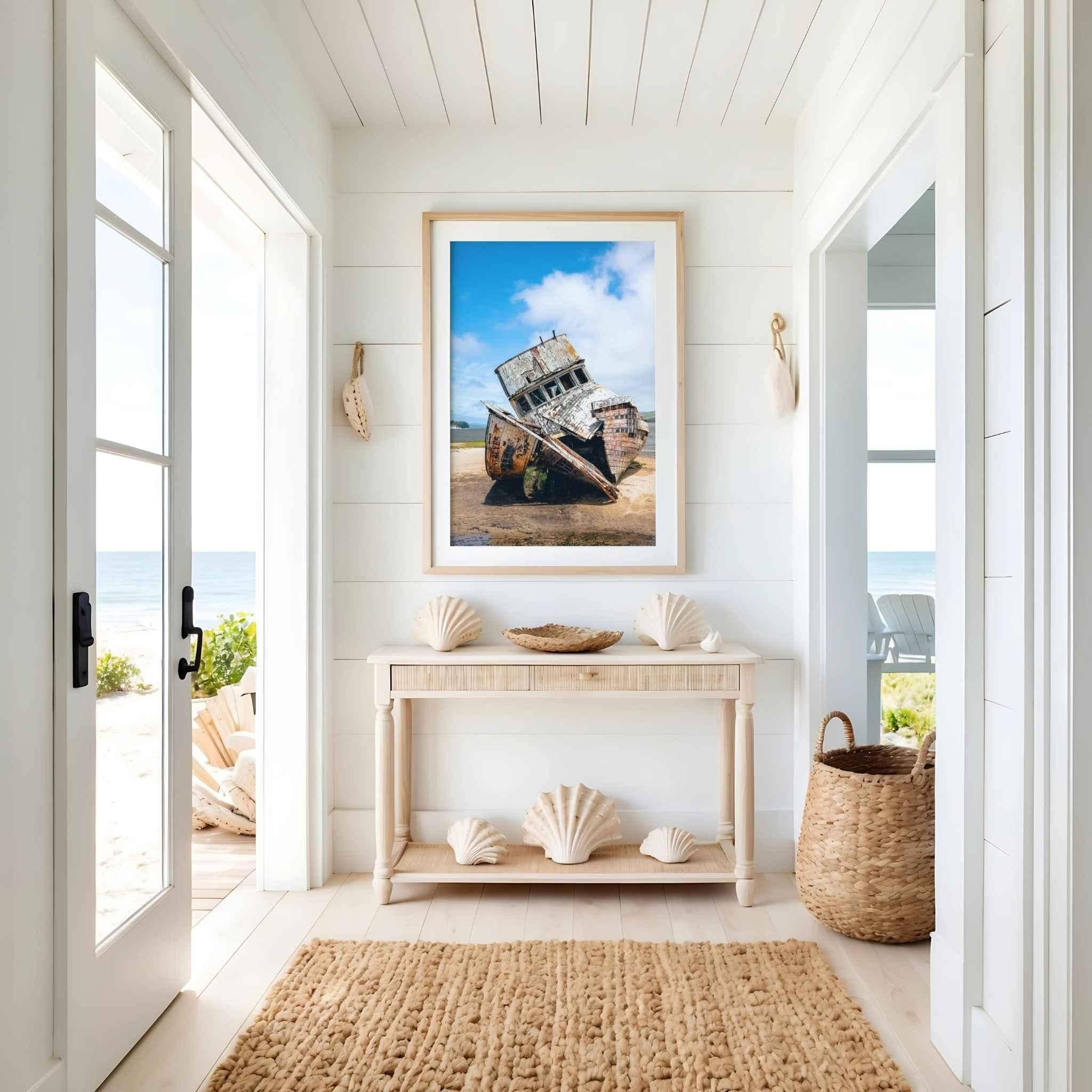 Historic S.S. Point Reyes shipwreck photograph displayed in a bright coastal entryway with beach-inspired décor, fine art photography by Abigail Diane Photography