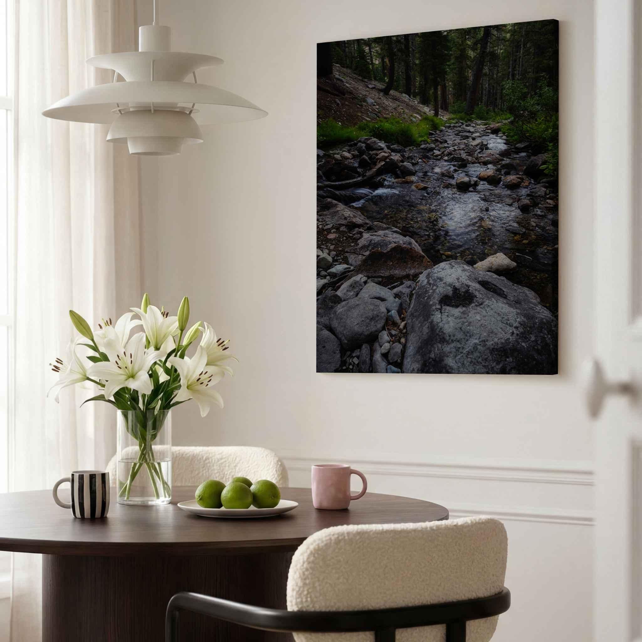 Steady Stream canvas print featuring a rocky mountain creek near Mammoth Lakes in California’s Eastern Sierra, displayed in a bright contemporary dining room.