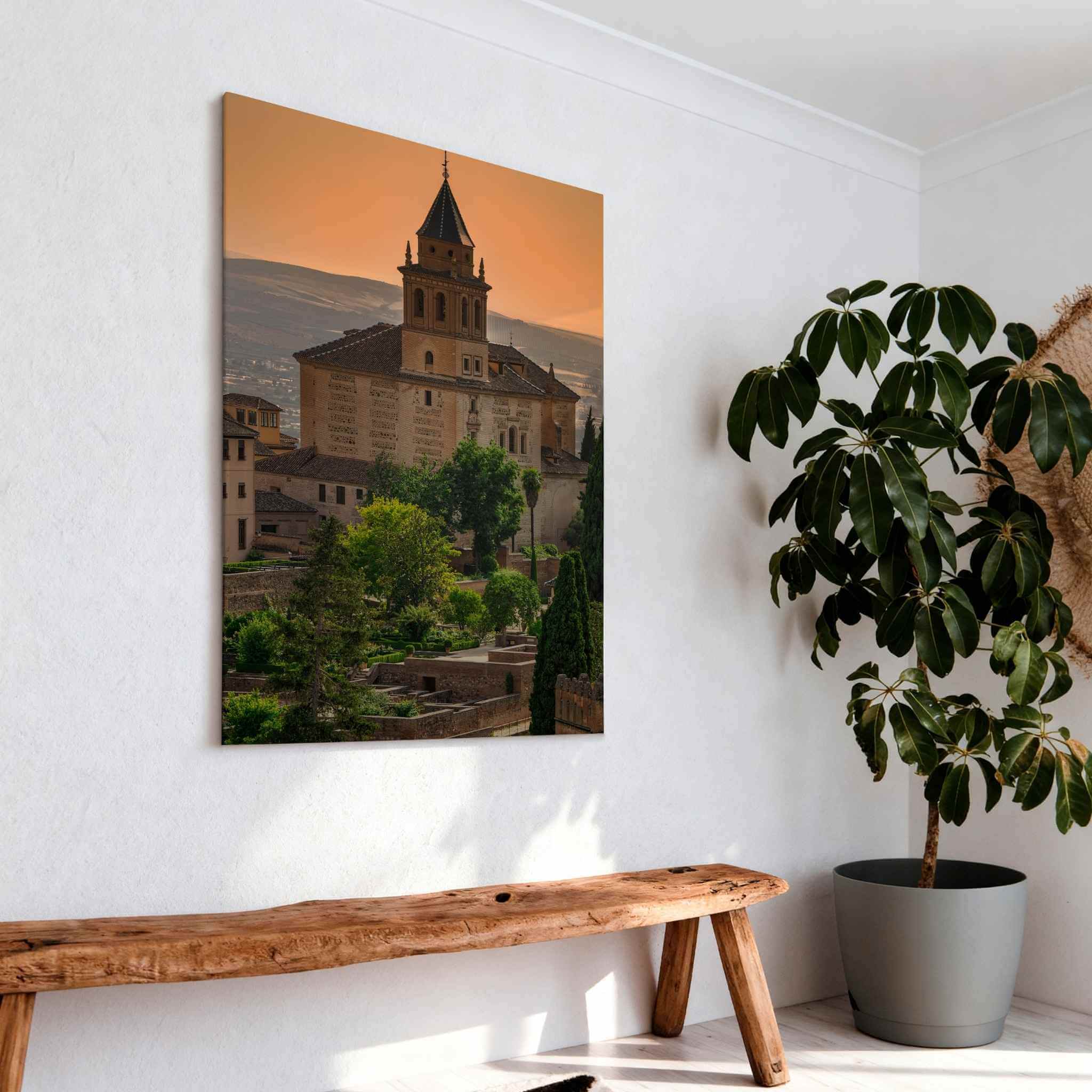  Summer Light at the Alhambra HD metal print displayed above a rustic wooden bench.