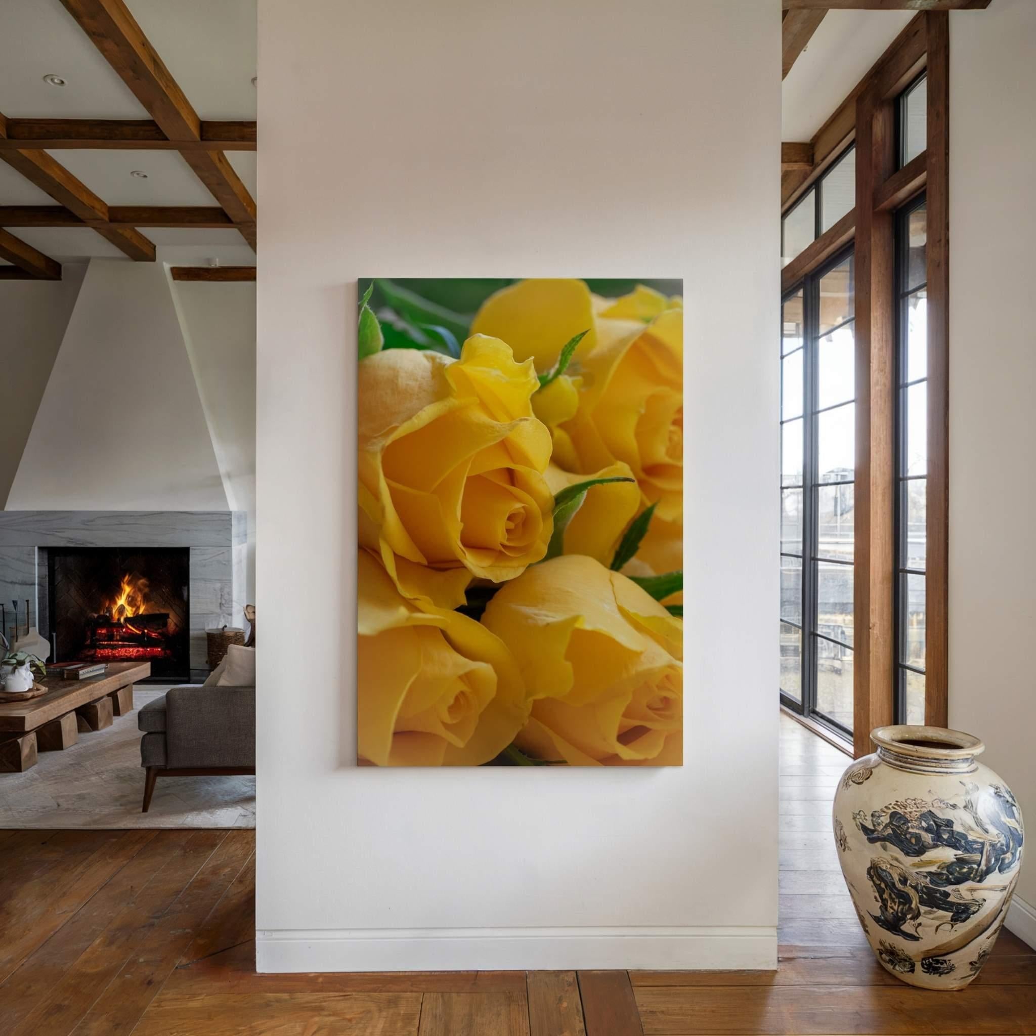 Sunlit Petal Reverie yellow rose fine art photography by Abigail Diane Photography displayed as a large gallery-wrapped canvas in a warm rustic living room with wood beams and fireplace. 
