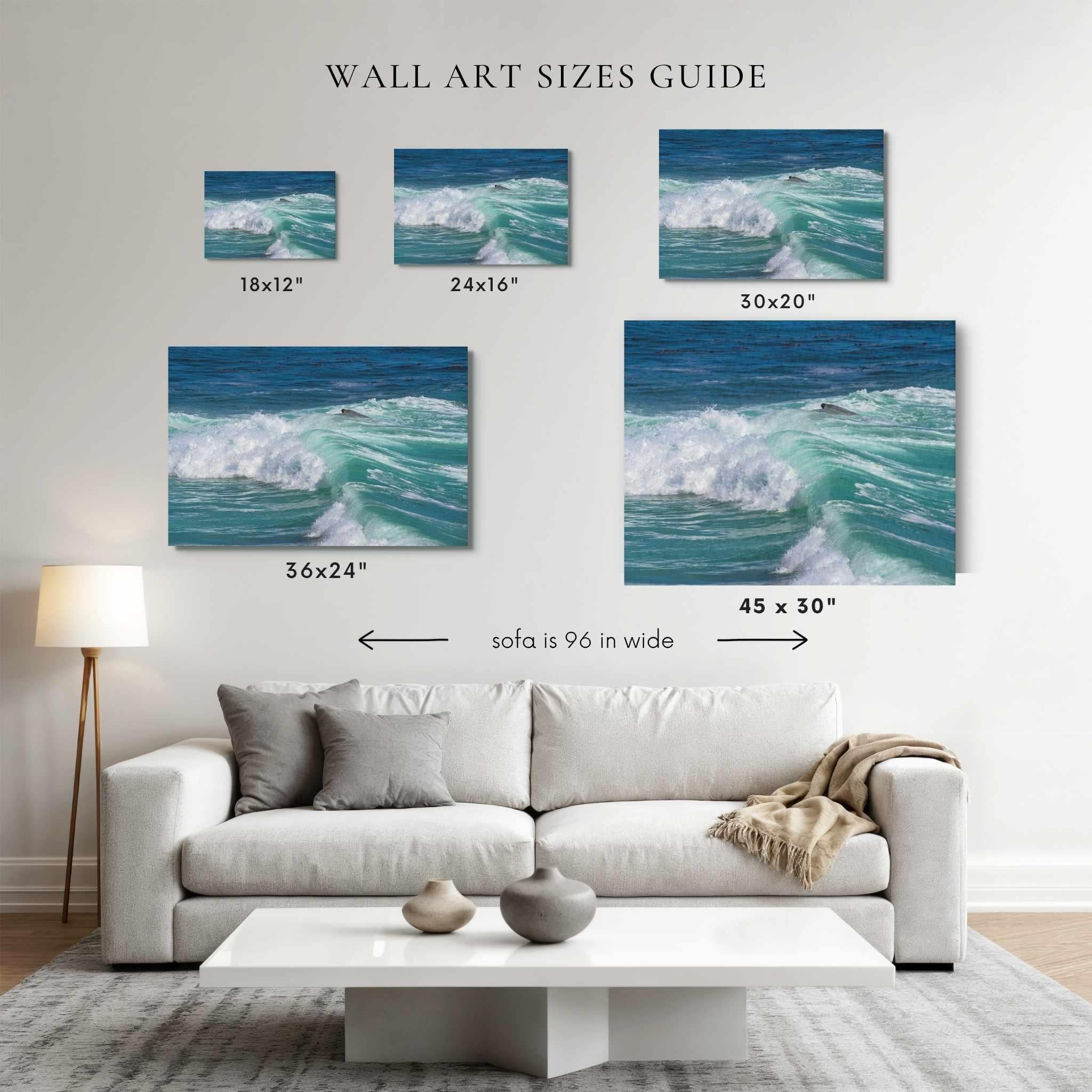 Wall art size guide displaying Turquoise Healing Waves fine art photography in 18x12, 24x16, 30x20 and 36x24 and  45 x 30 inch sizes above a 96-inch sofa for scale. This Laguna Beach, California coastal photograph showcases turquoise Pacific Ocean waves and helps customers visualize artwork sizing for their home.