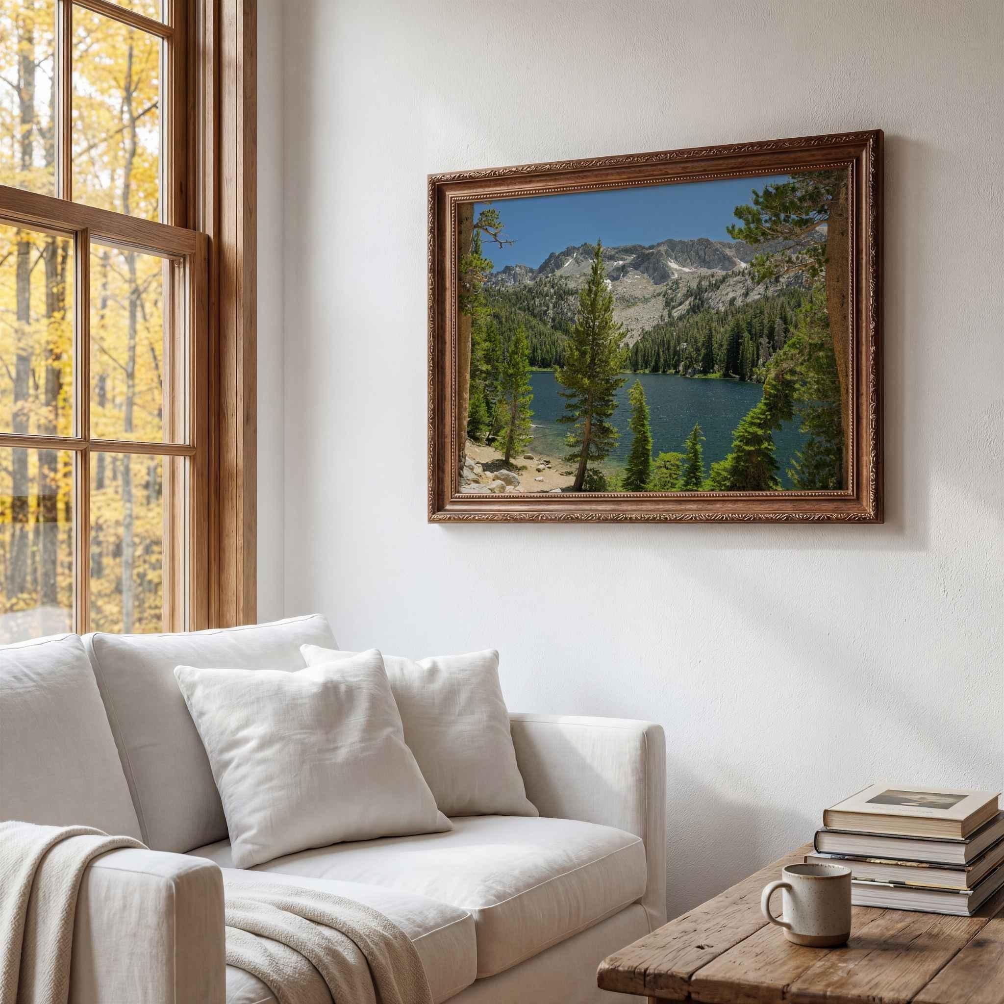 Where the Trail Gives Way to Still Waters framed print displayed in a cozy neutral living room, featuring a blue alpine lake surrounded by pines and Sierra Nevada peaks near Mammoth Lakes, California.