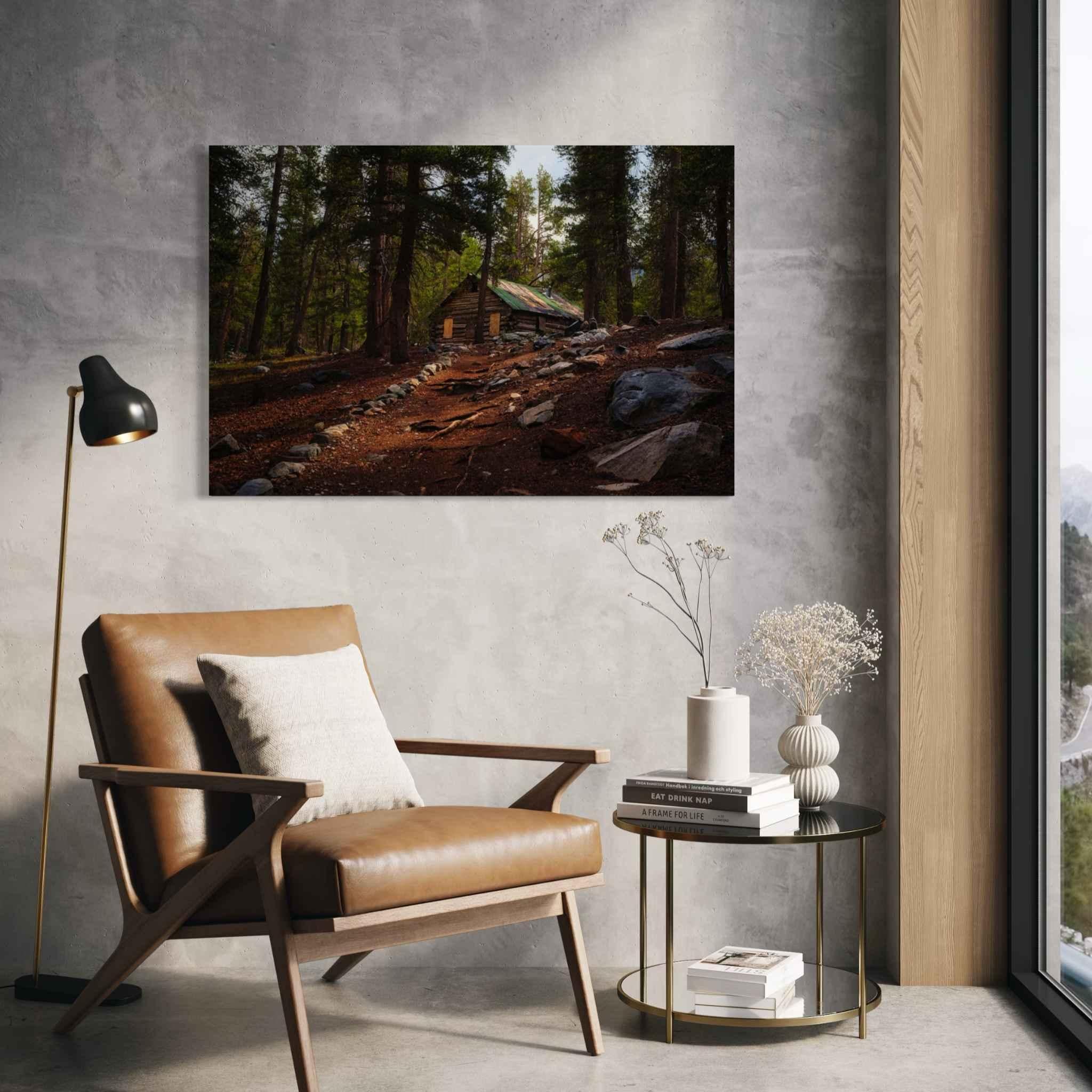  Where the Trail Meets the Past metal wall art from Mammoth Lakes, California, displayed in a mountain-modern interior with a leather chair and natural wood accents.