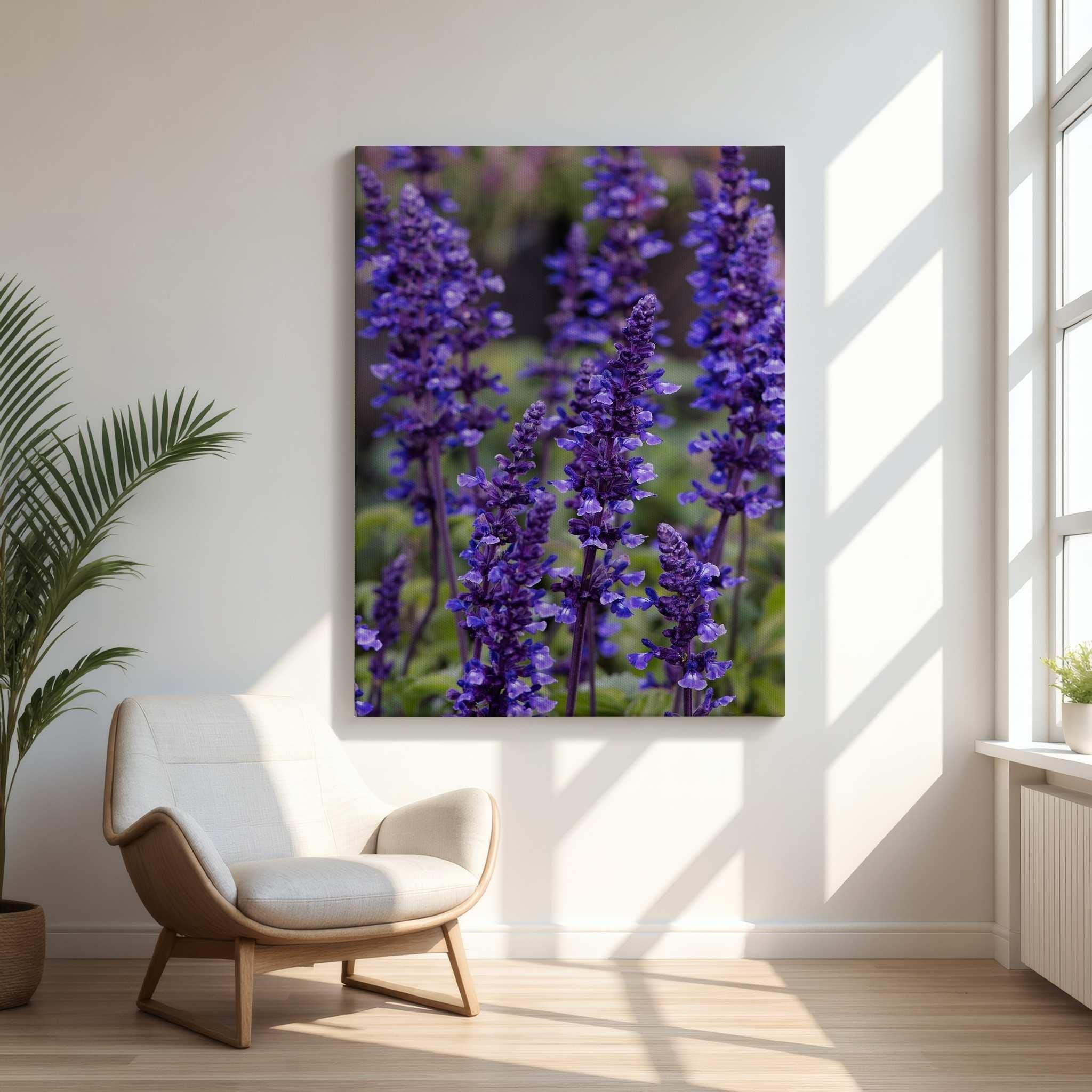 Where the Wildflowers Dream canvas wall art by Abigail Diane Photography featuring vibrant purple salvia flowers in bloom, displayed above a modern lounge chair in a bright sunlit room with natural light and botanical décor.